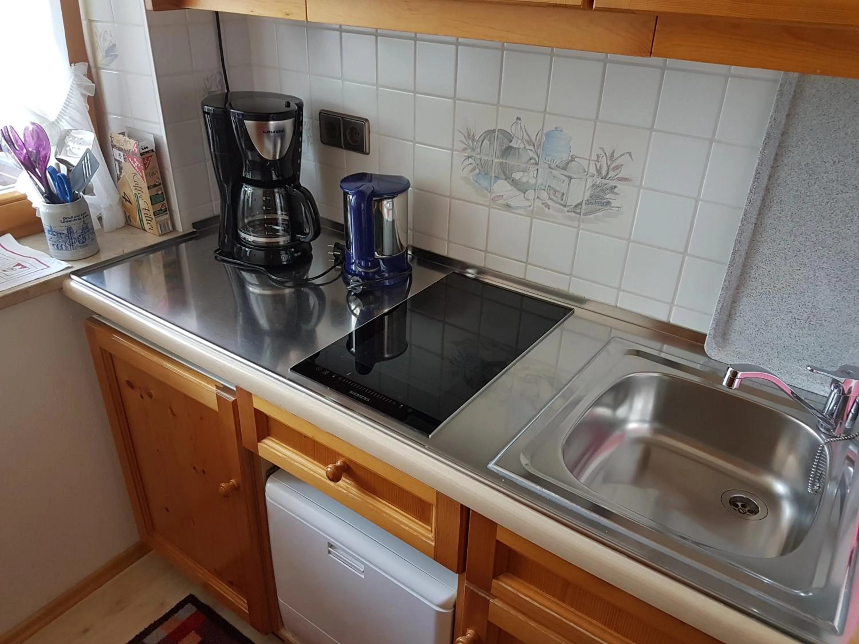 Kitchen or kitchenette in Haus Karoline