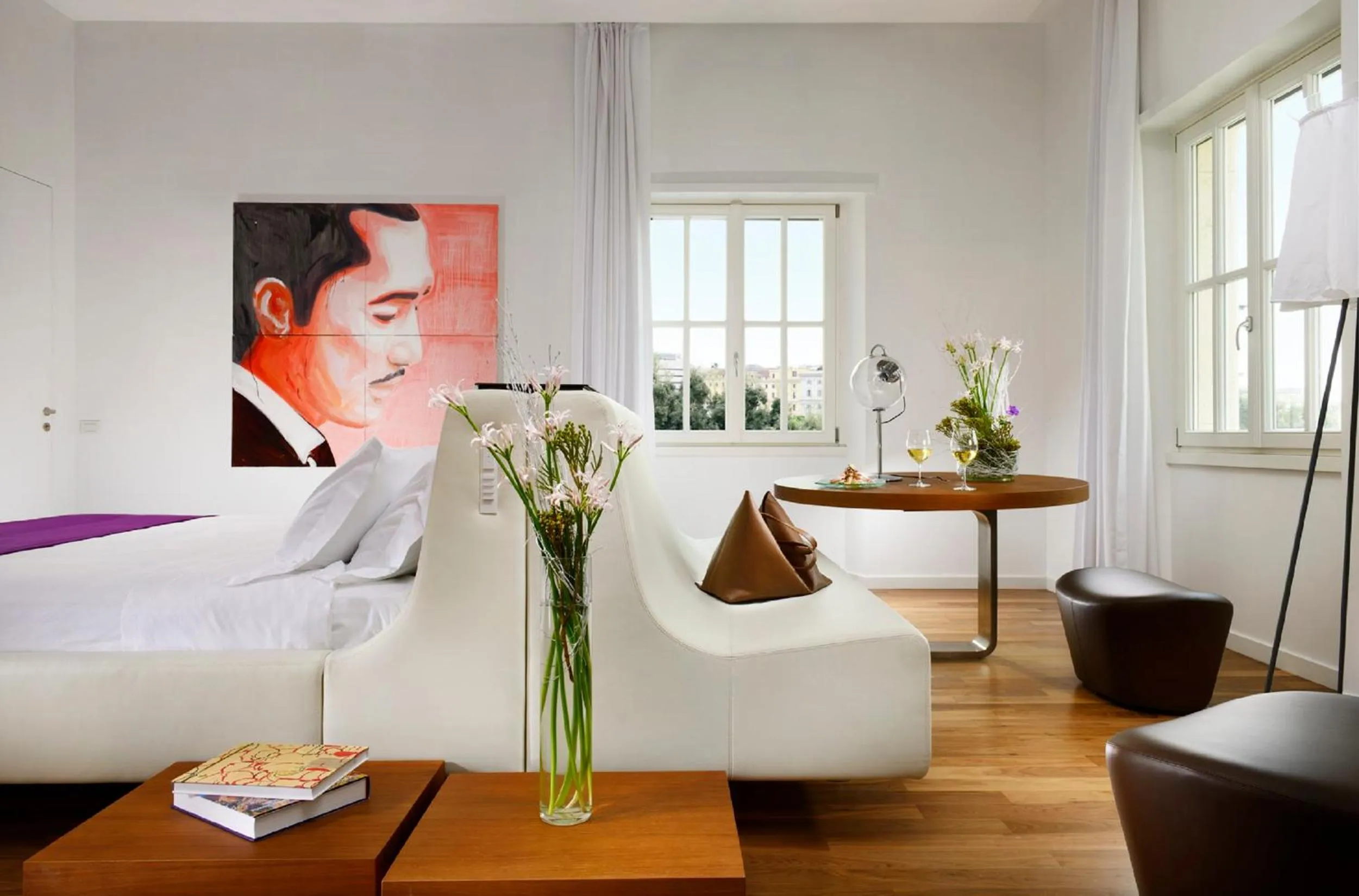 Bed in Palazzo Montemartini Rome, A Radisson Collection Hotel