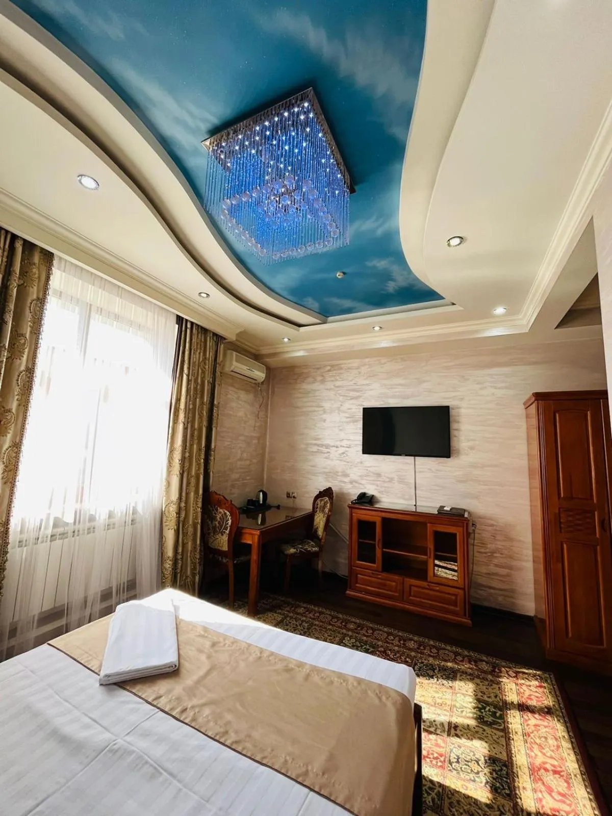 Photo of the whole room, Bed in Akzhol Hotel Almaty