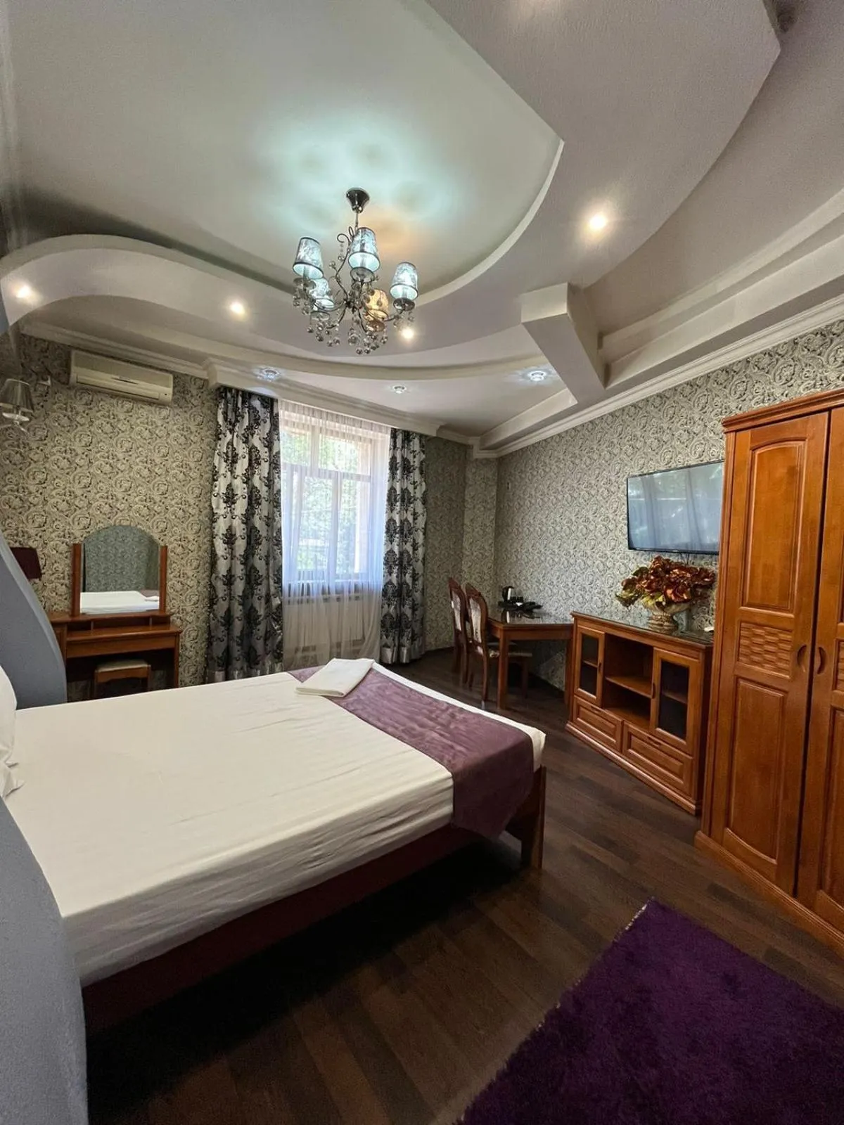 Photo of the whole room, Bed in Akzhol Hotel Almaty