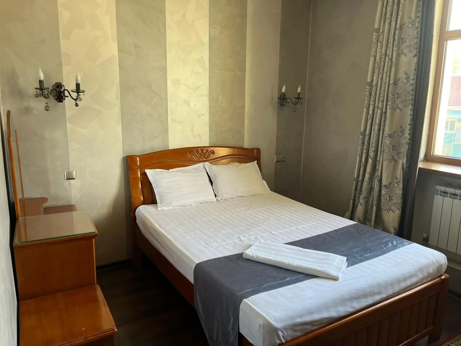 Bed in Akzhol Hotel Almaty