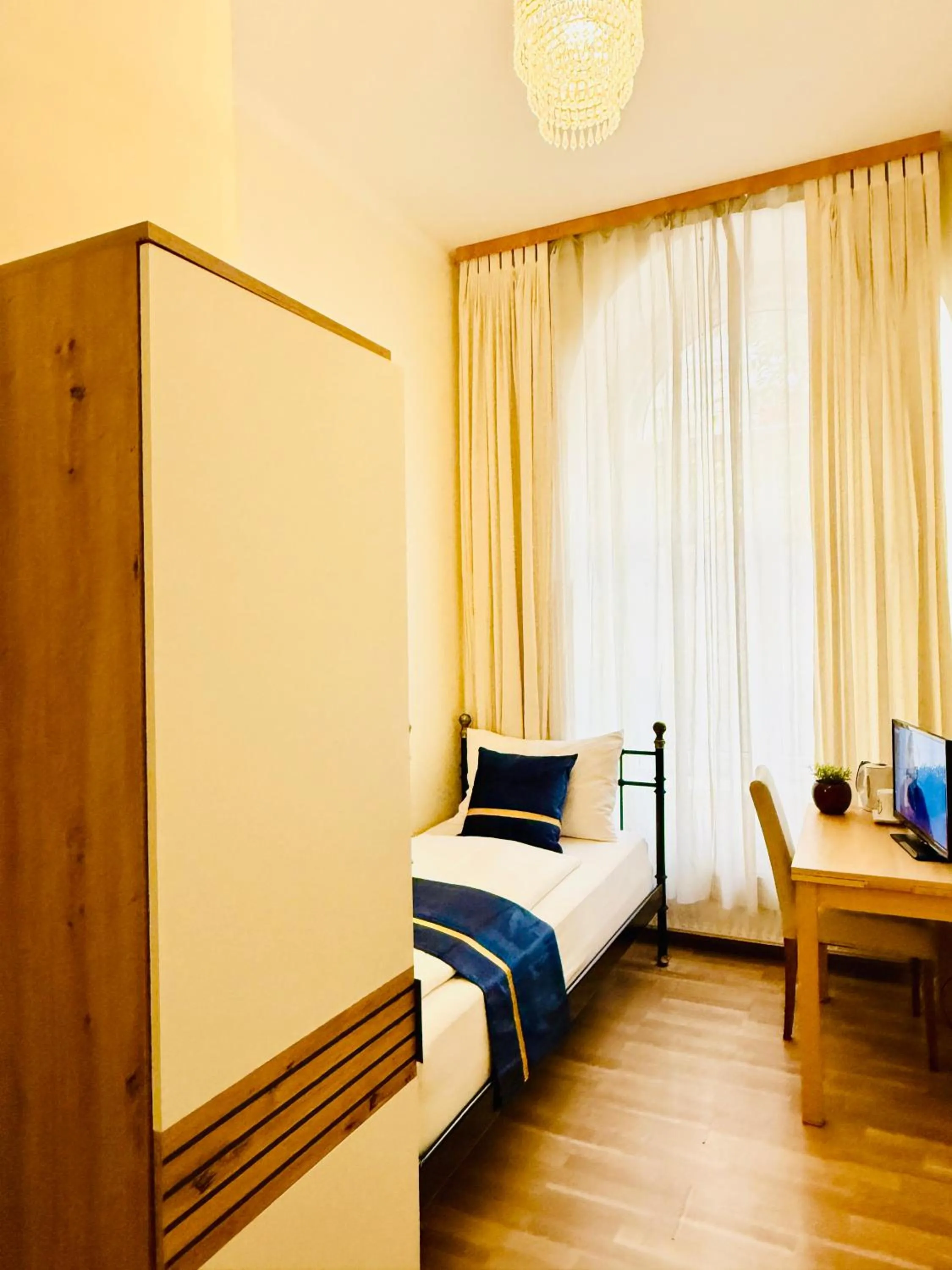 Photo of the whole room, Bed in Pension Liechtenstein