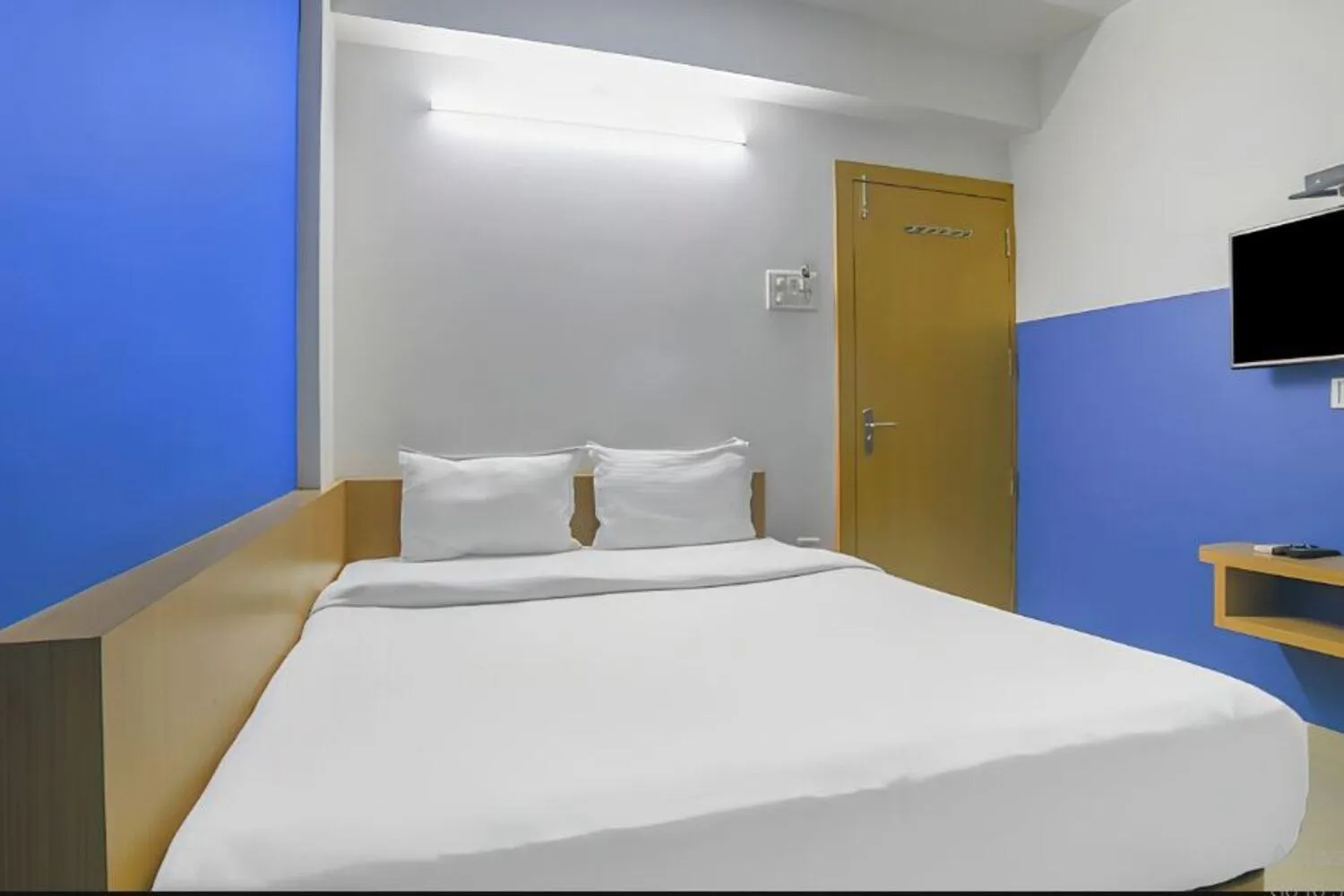 Bed in Hotel Satyug Inn