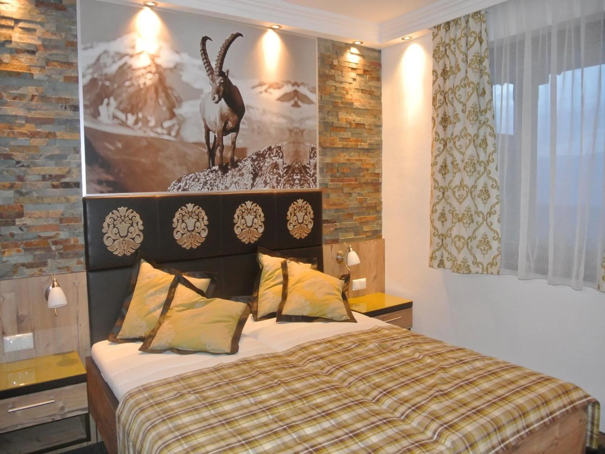 Photo of the whole room, Bed in Hotel Baumgartnerhof