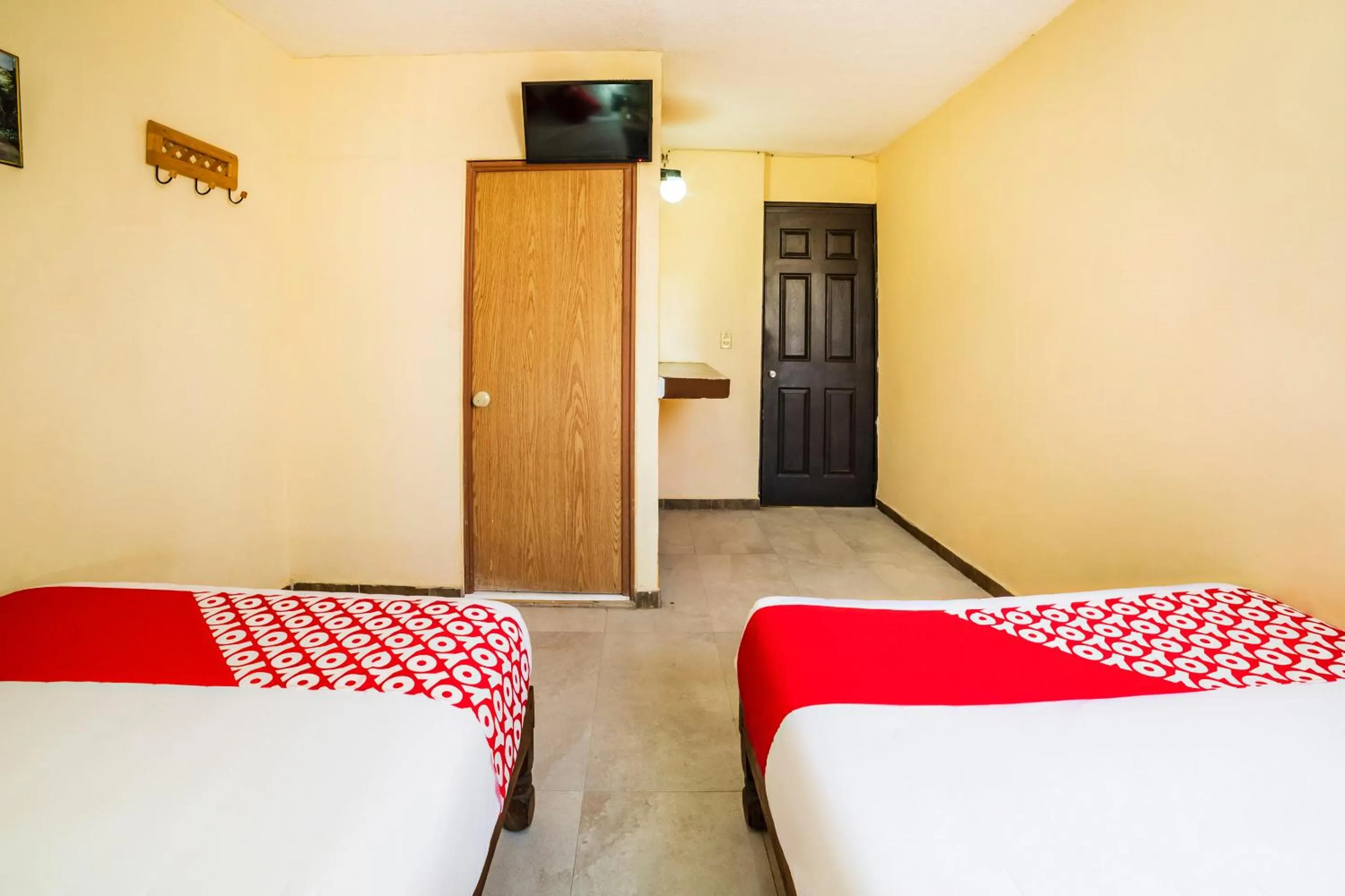 TV and multimedia, Bed in OYO Hotel Bugambilia, San Luis Potosí