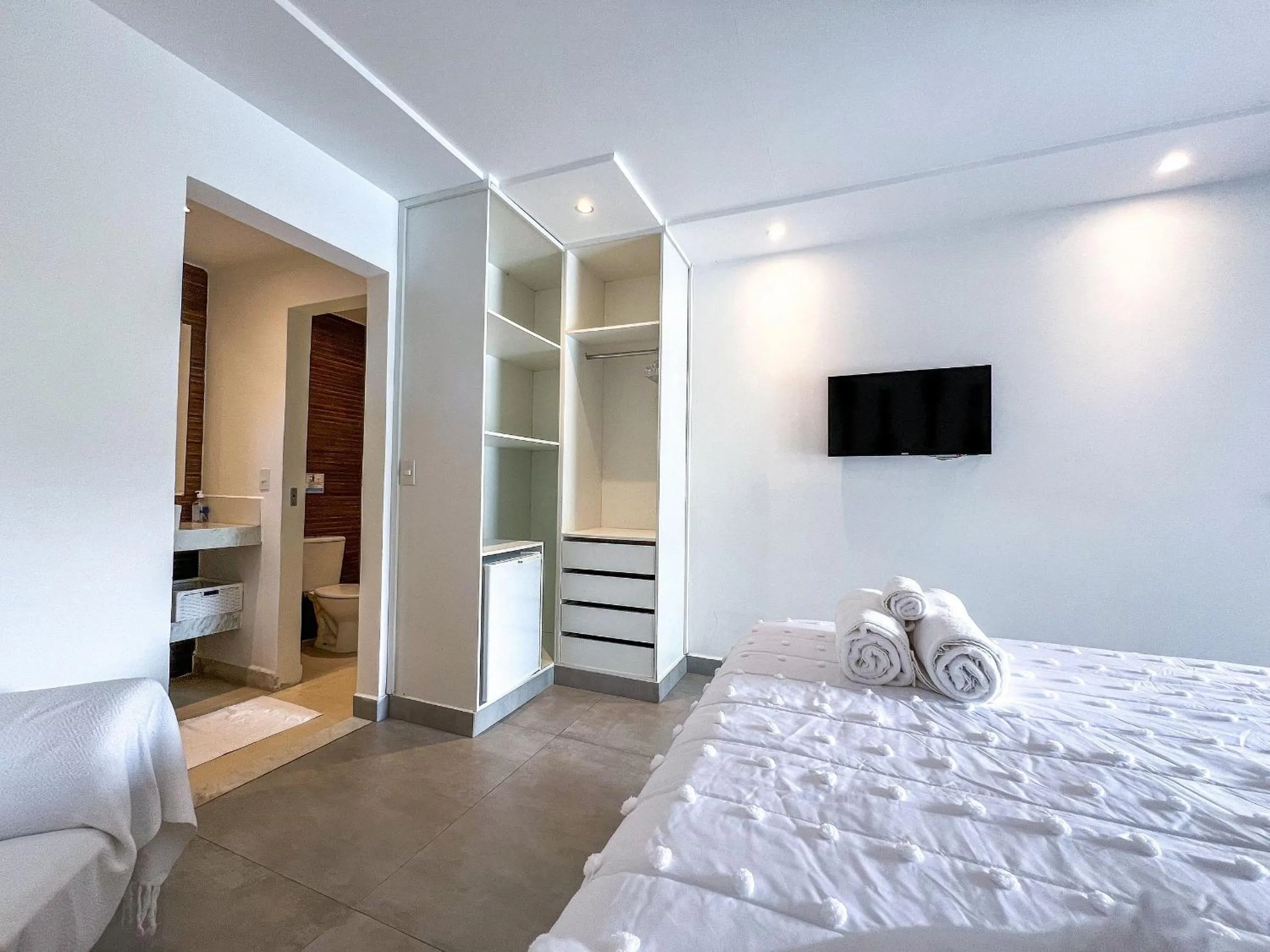 TV and multimedia, Bed in Pousada Brisa