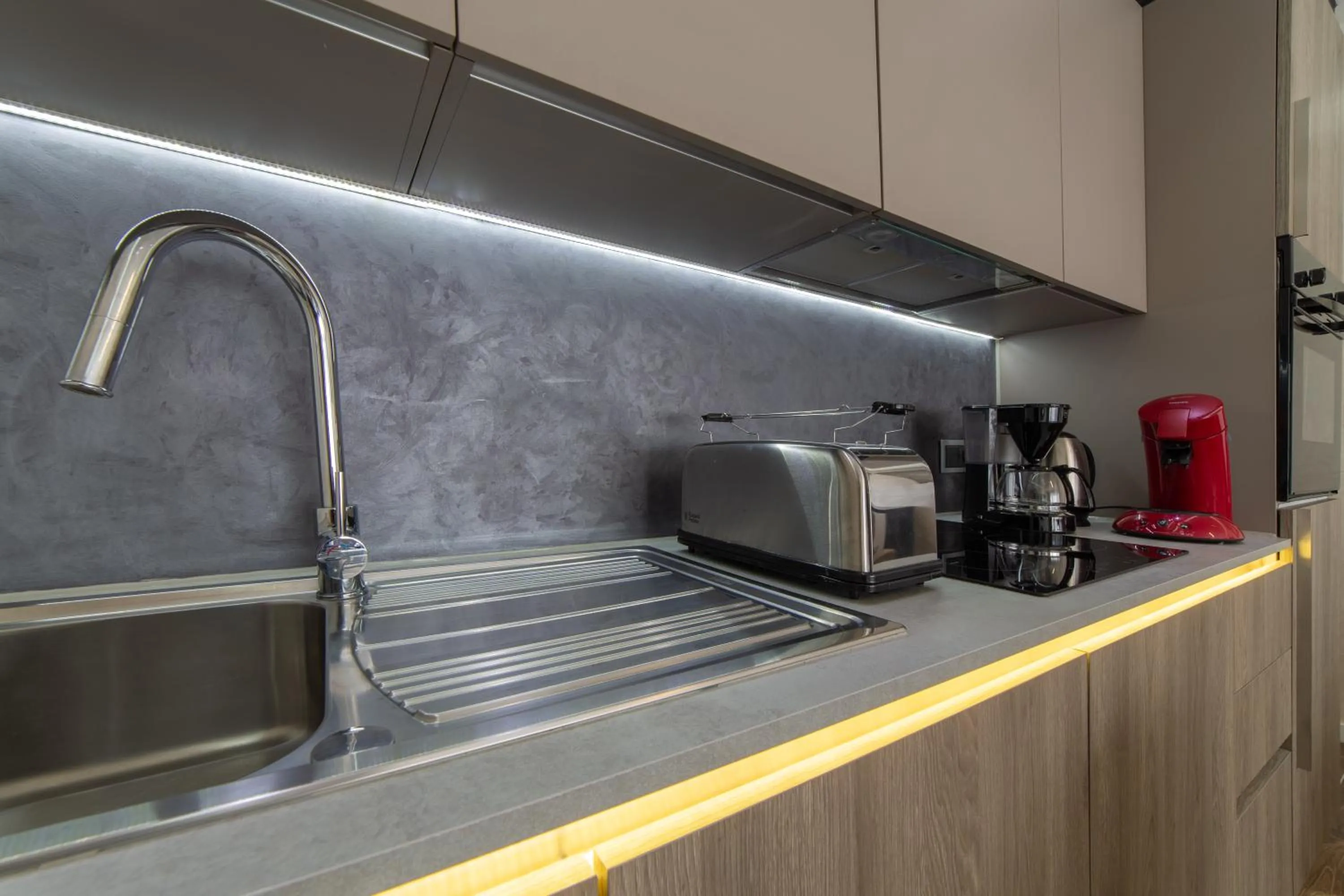 Kitchen or kitchenette in The Queen Luxury Apartments - Villa Carlotta