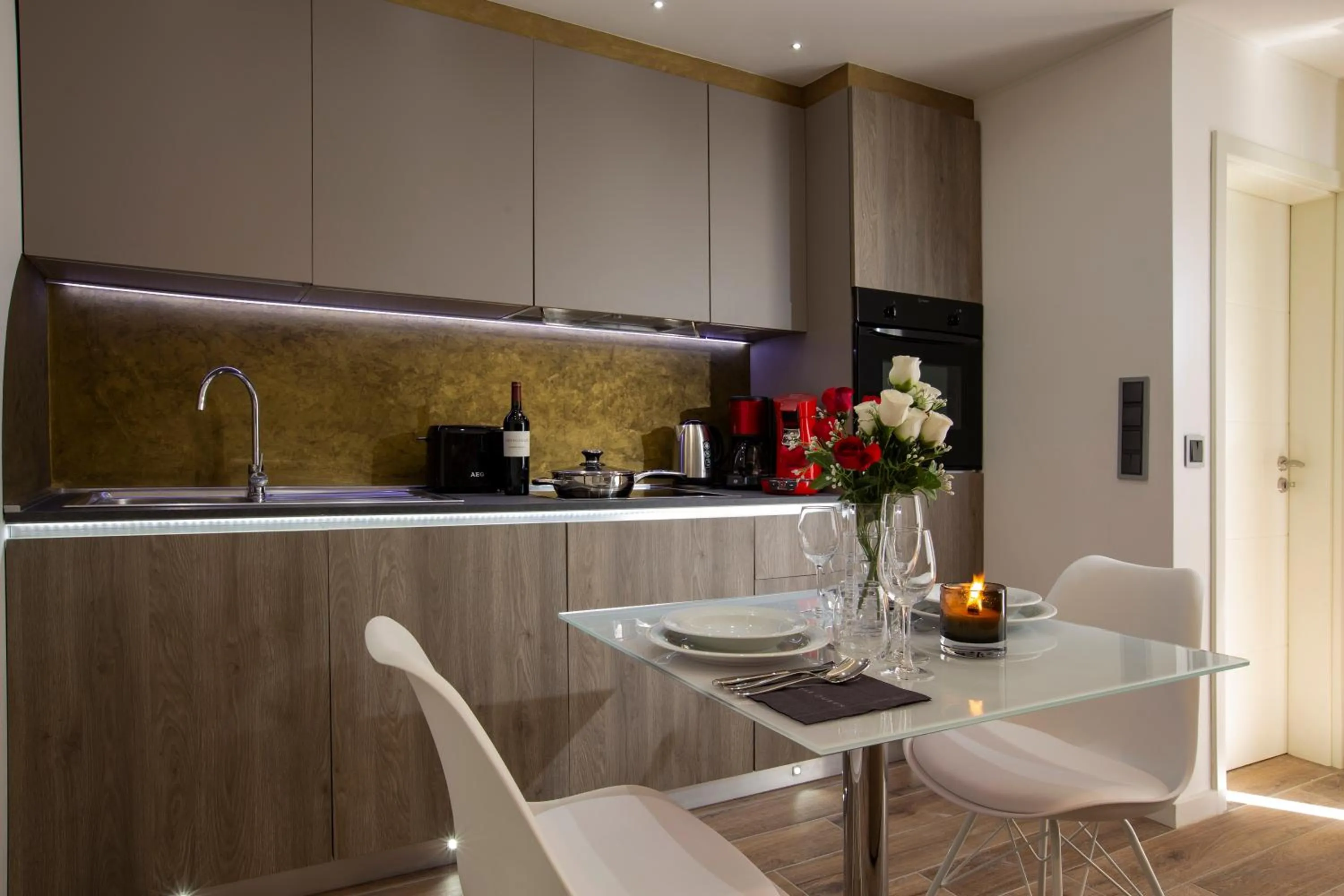 Kitchen or kitchenette in The Queen Luxury Apartments - Villa Carlotta