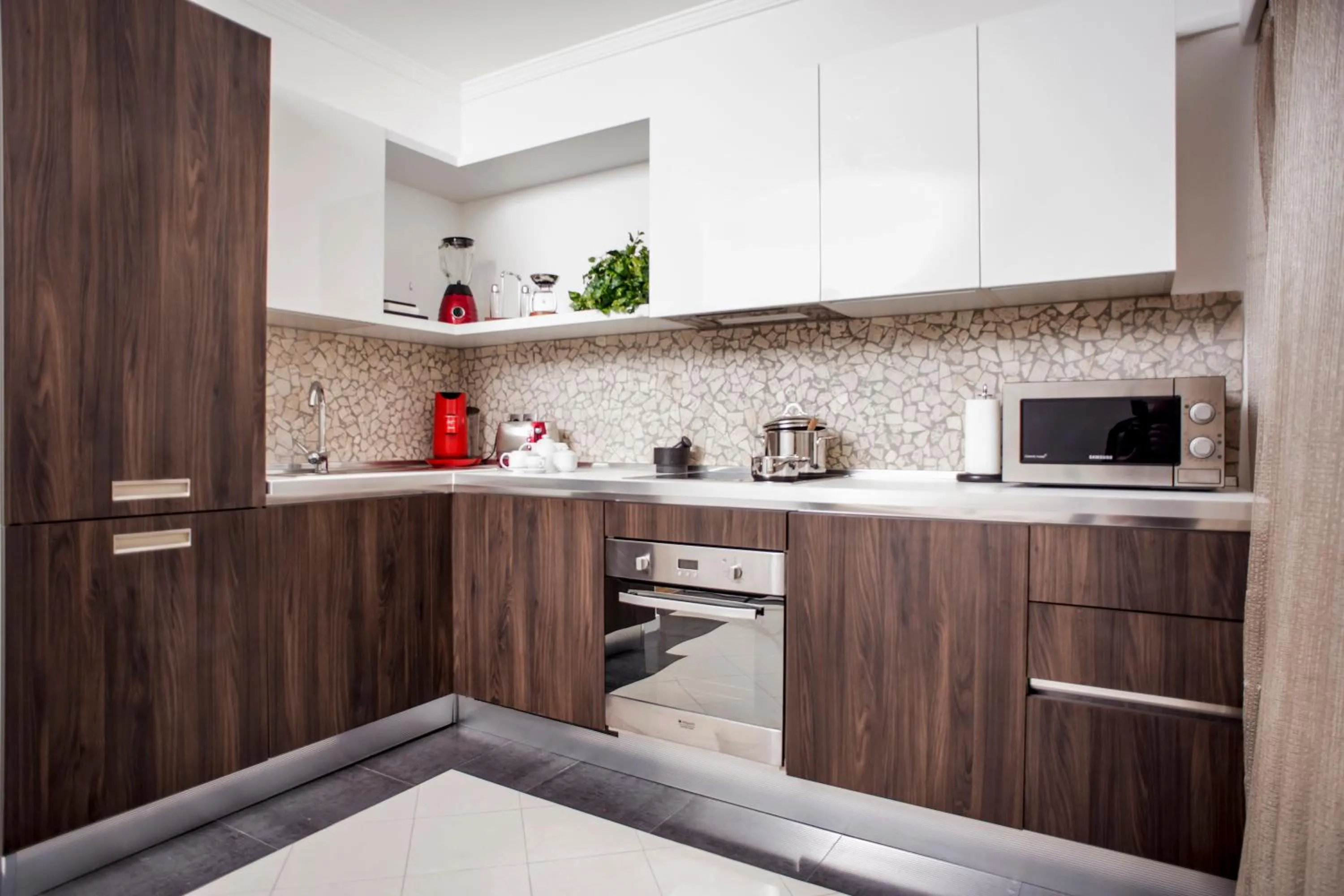 Kitchen or kitchenette in The Queen Luxury Apartments - Villa Carlotta
