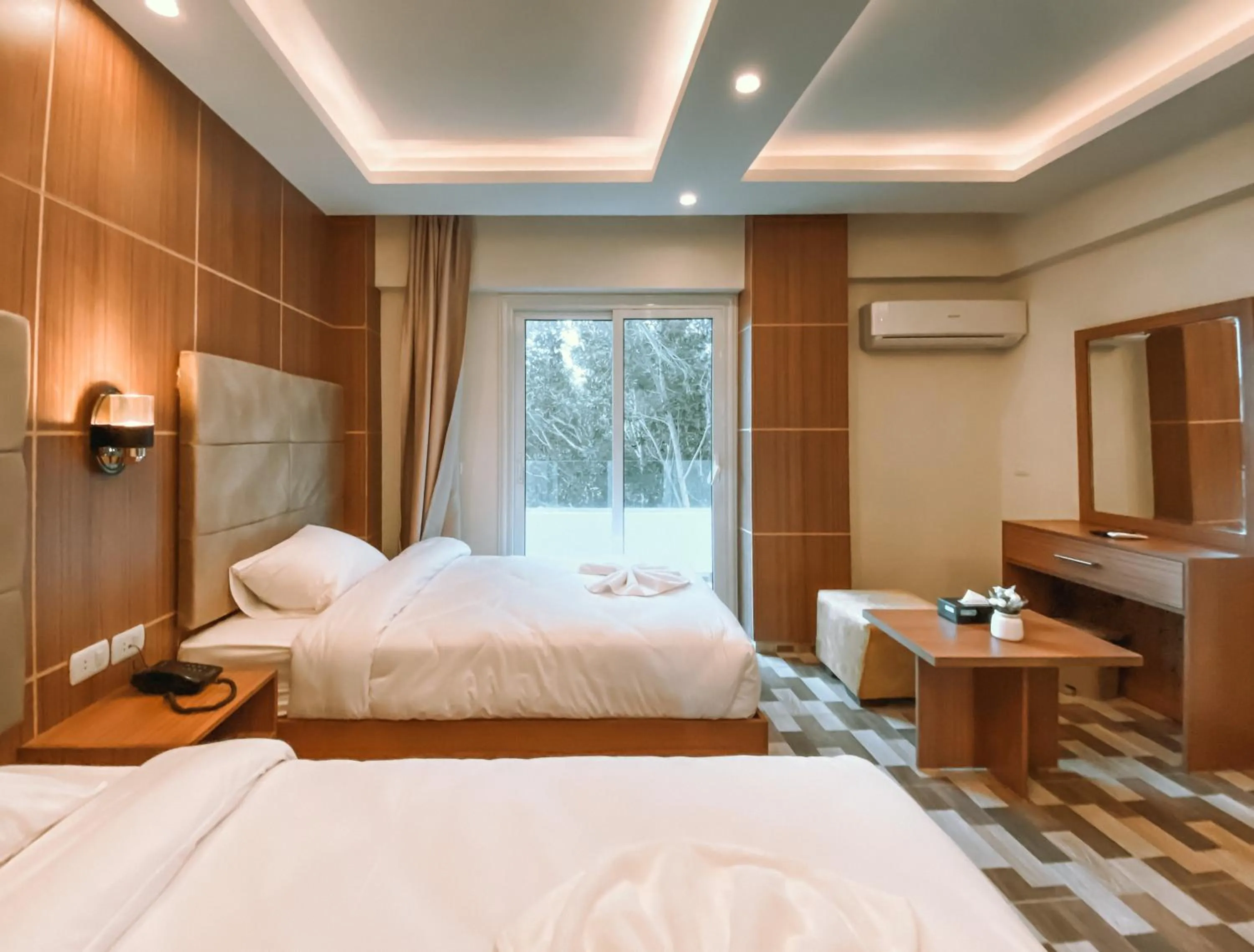 Bed in Nine Pyramids View Hotel