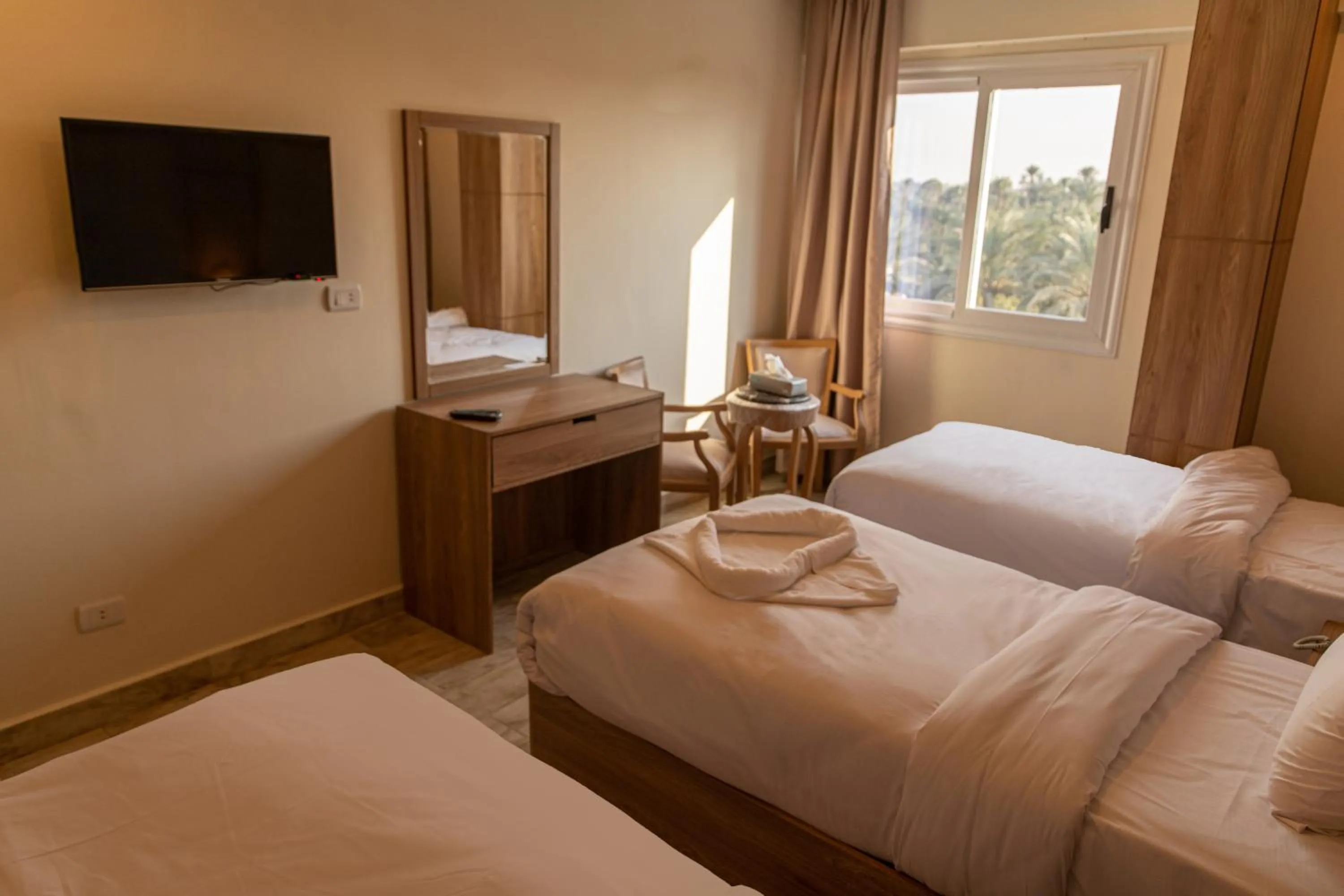 Bed in Nine Pyramids View Hotel