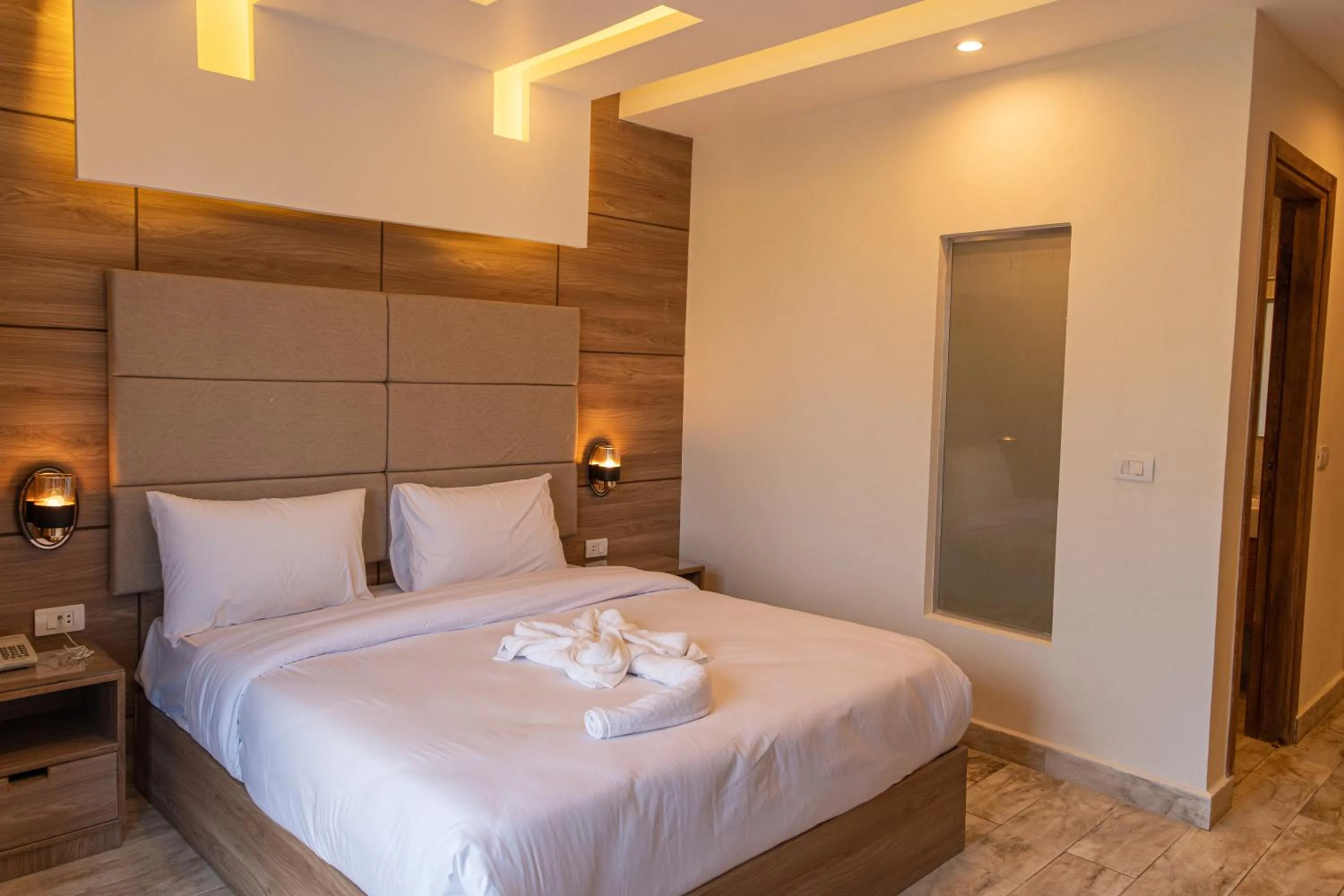 Bed in Nine Pyramids View Hotel