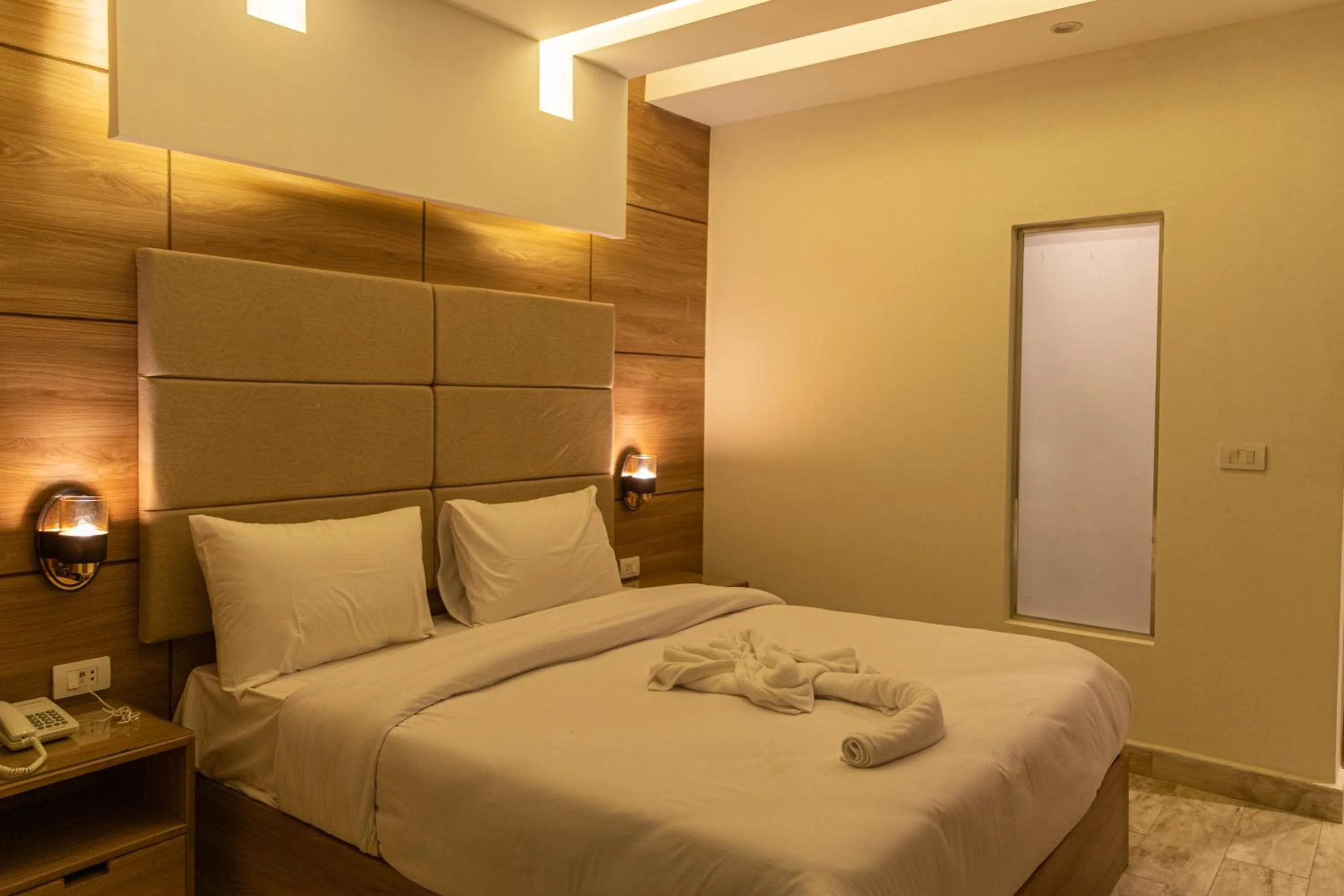 Bed in Nine Pyramids View Hotel