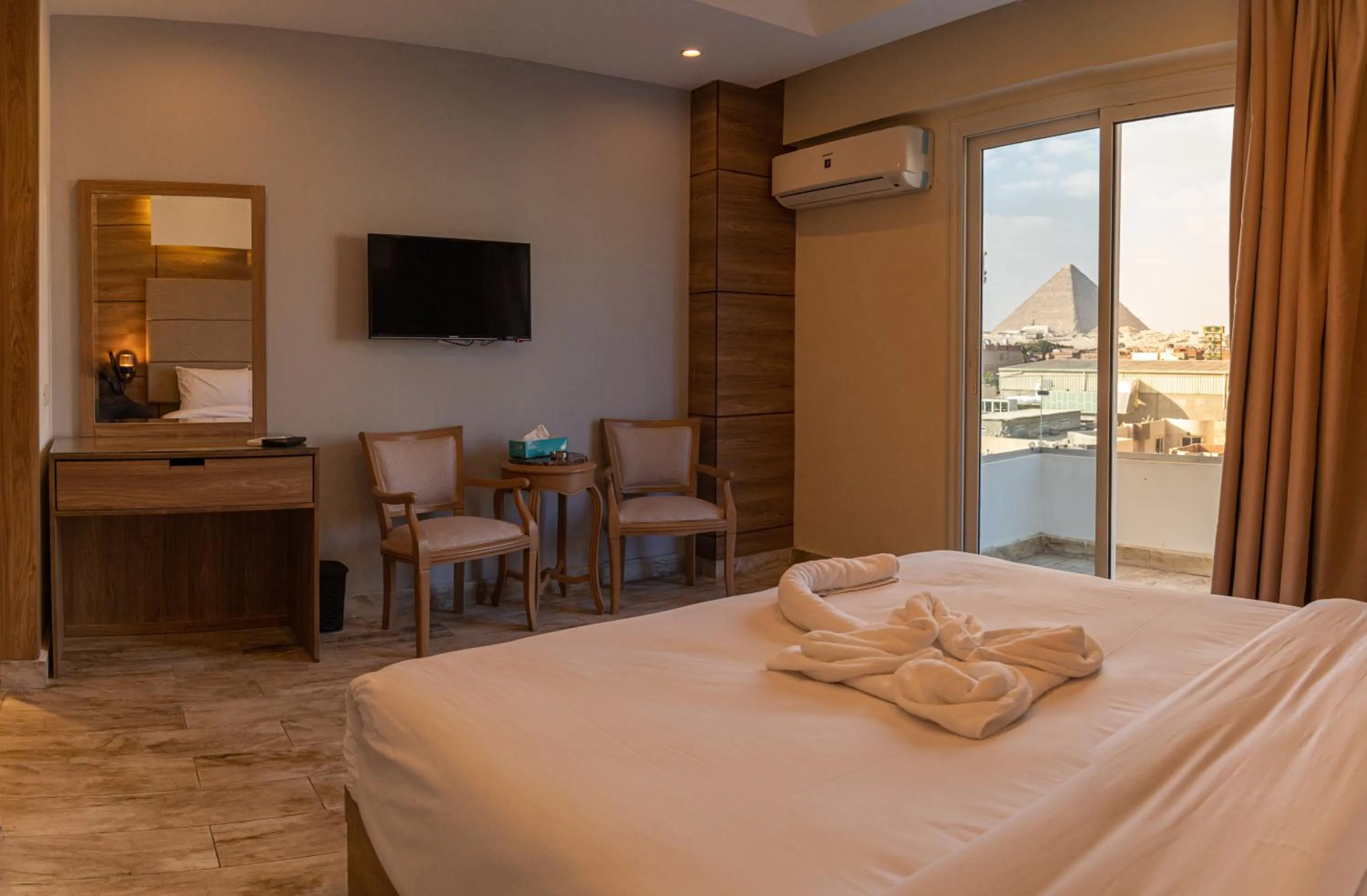 Bed in Nine Pyramids View Hotel