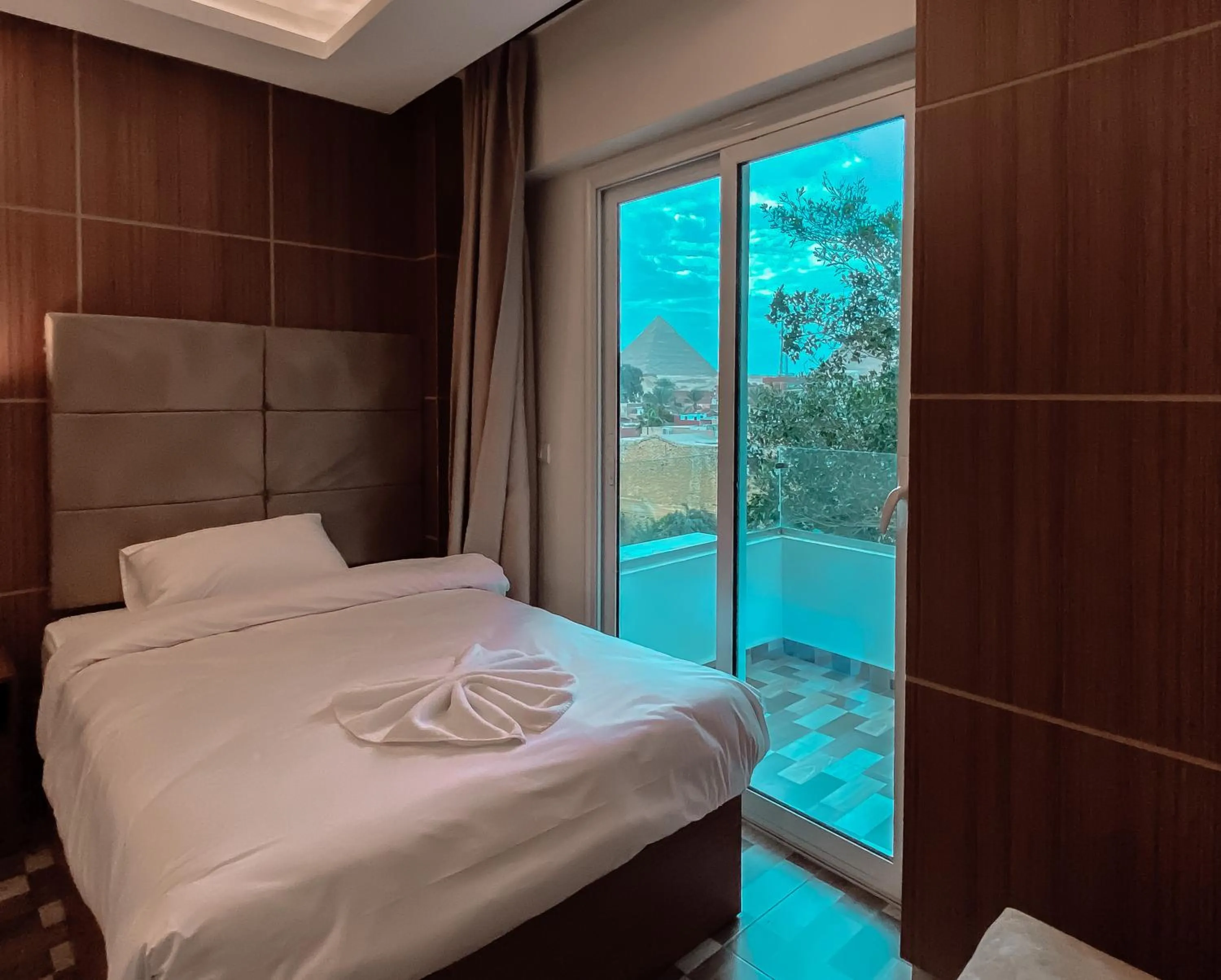 Bed in Nine Pyramids View Hotel