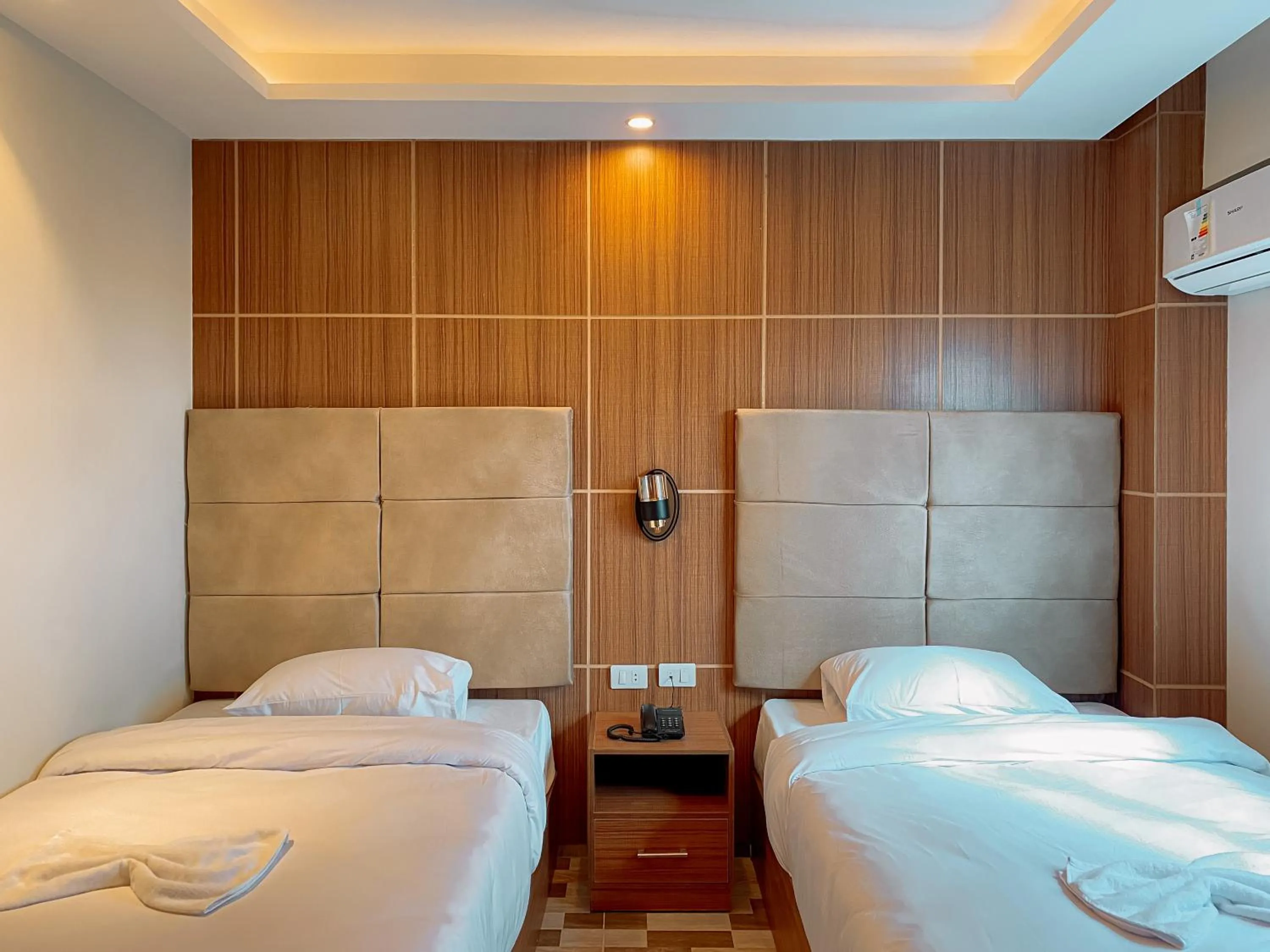 Bed in Nine Pyramids View Hotel