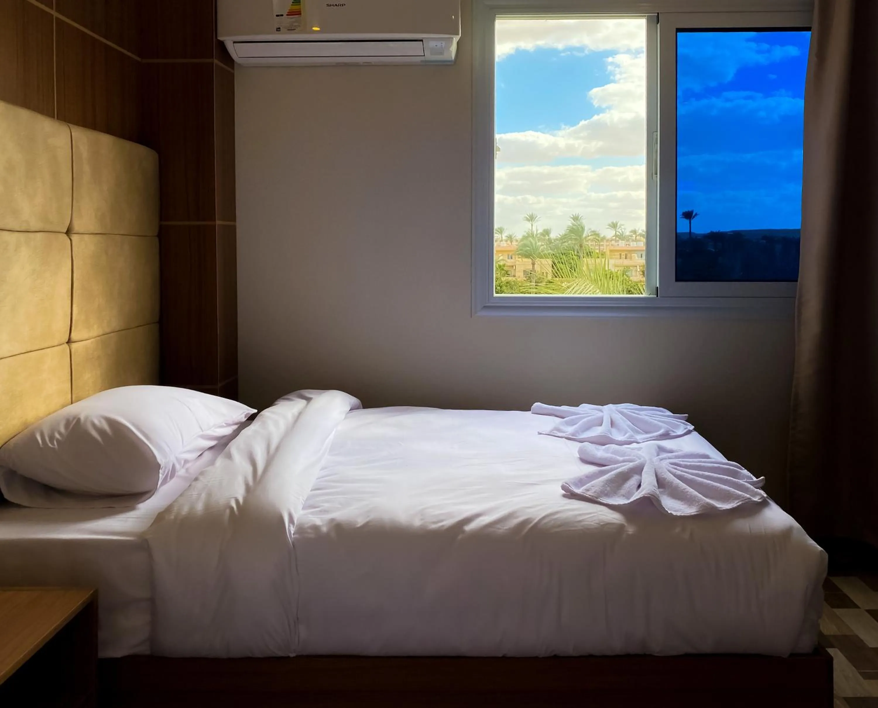 Bed in Nine Pyramids View Hotel