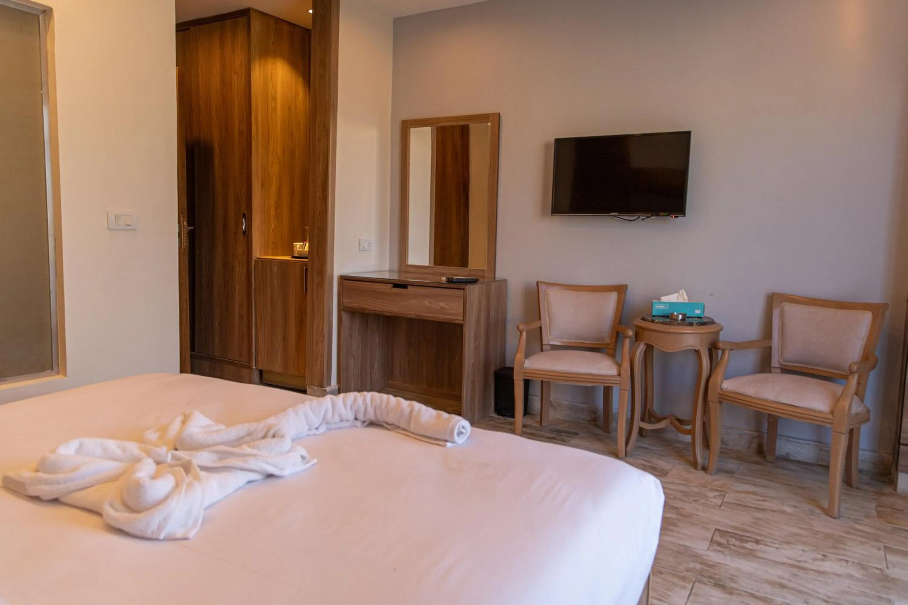 Bed in Nine Pyramids View Hotel