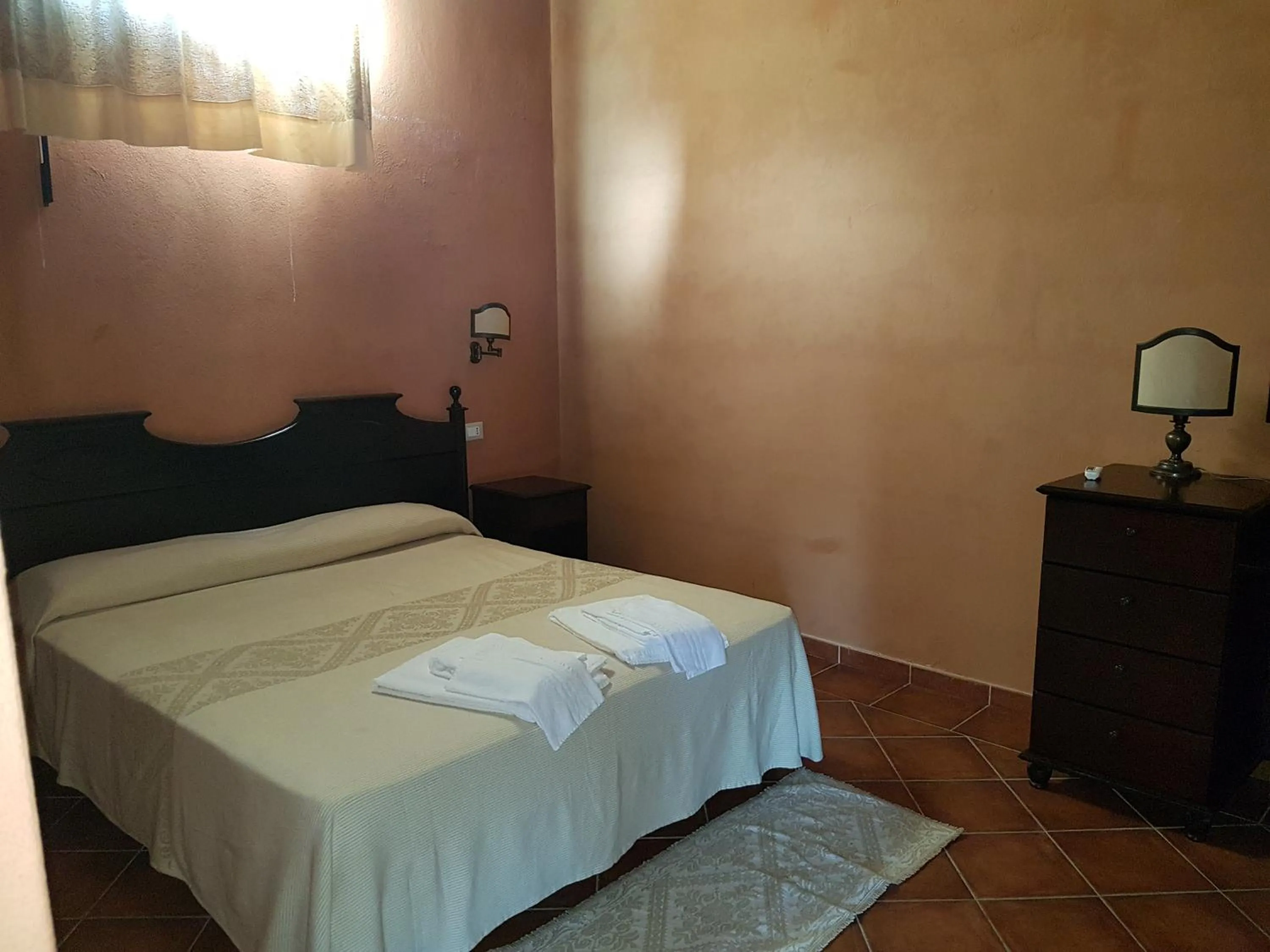 Bed in Hotel Sardus Pater