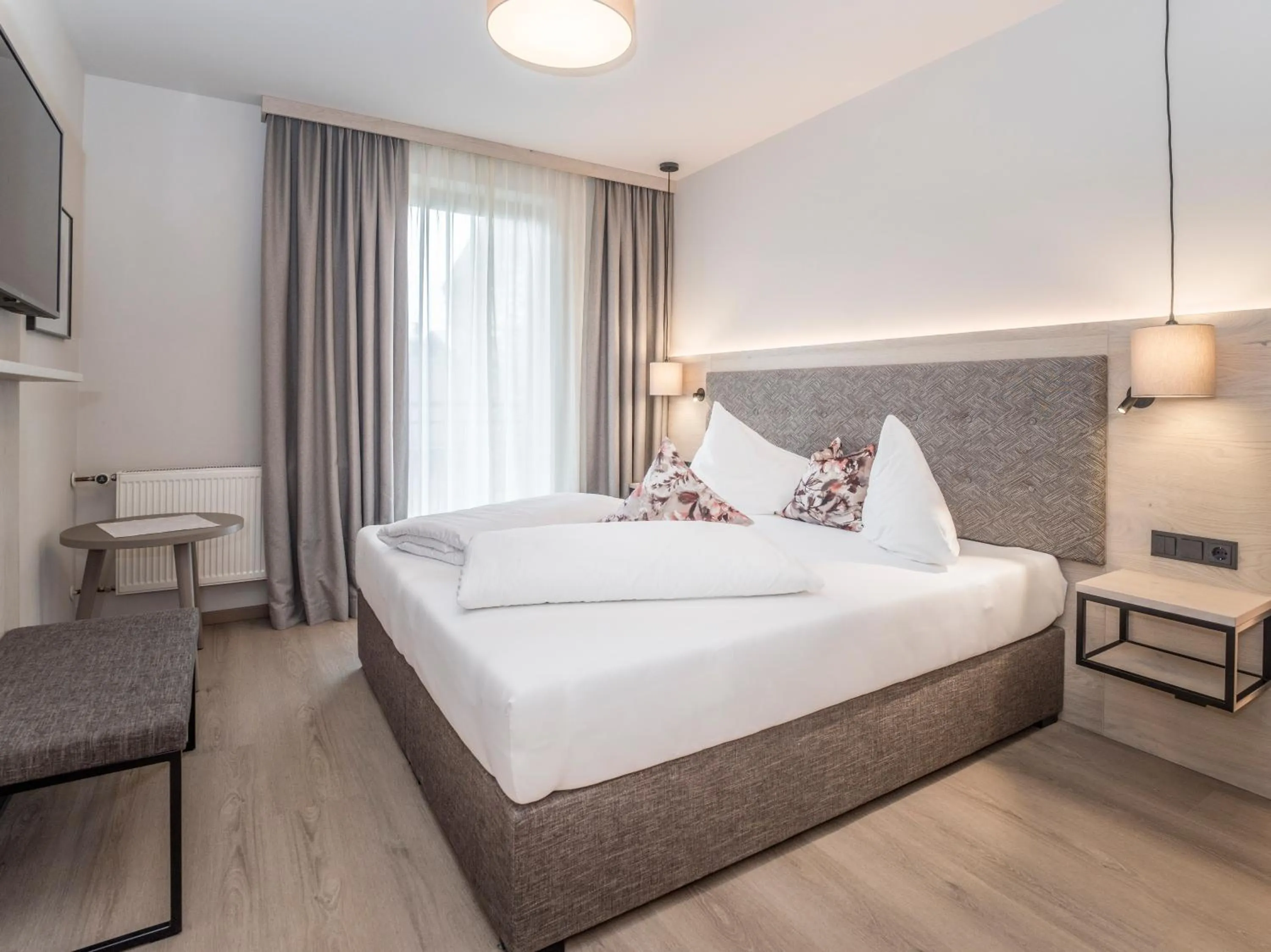 Photo of the whole room, Bed in Aktivhotel Schweizerhof Kitzbühel