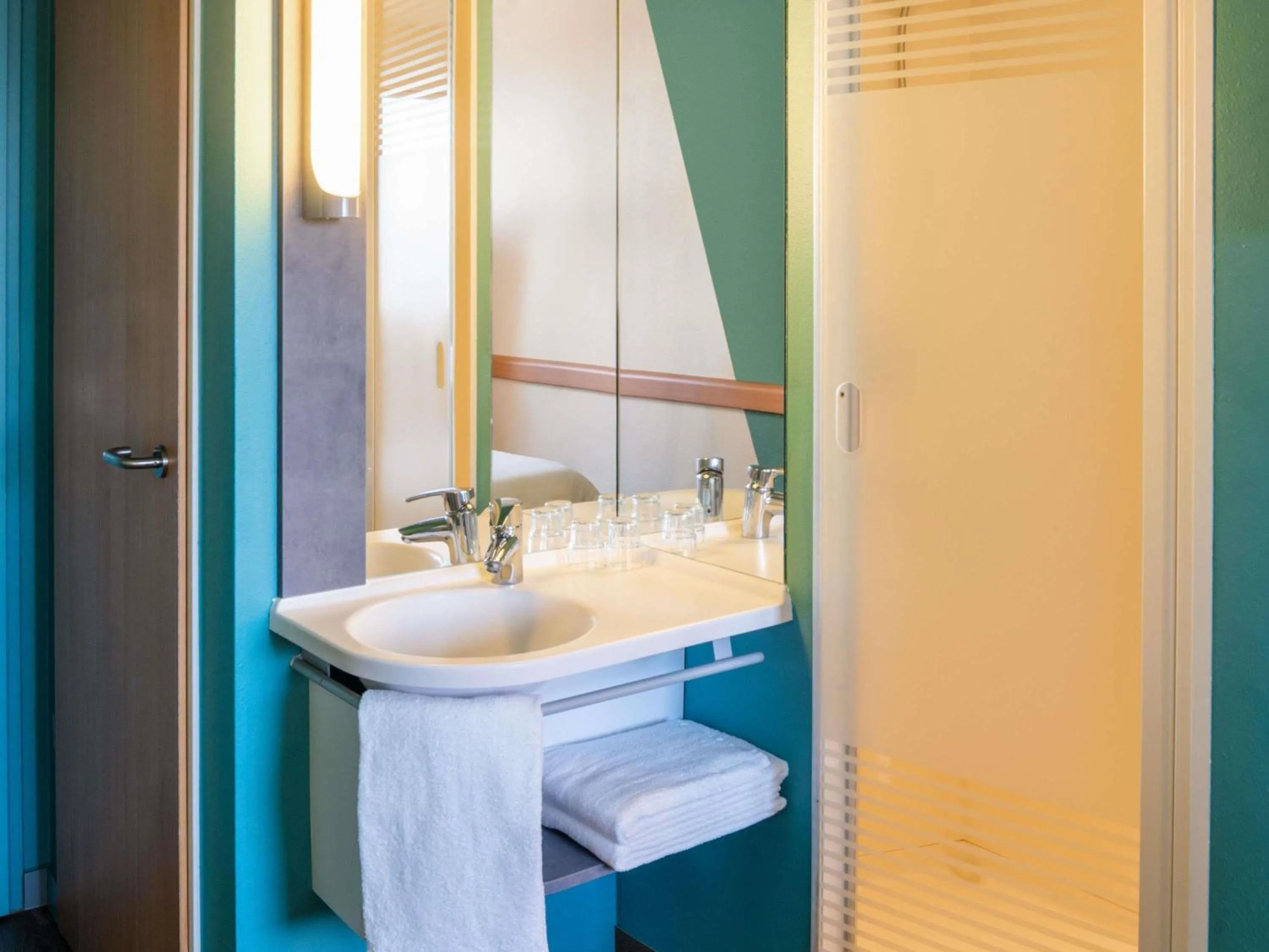 Bedroom in ibis budget Ulm City