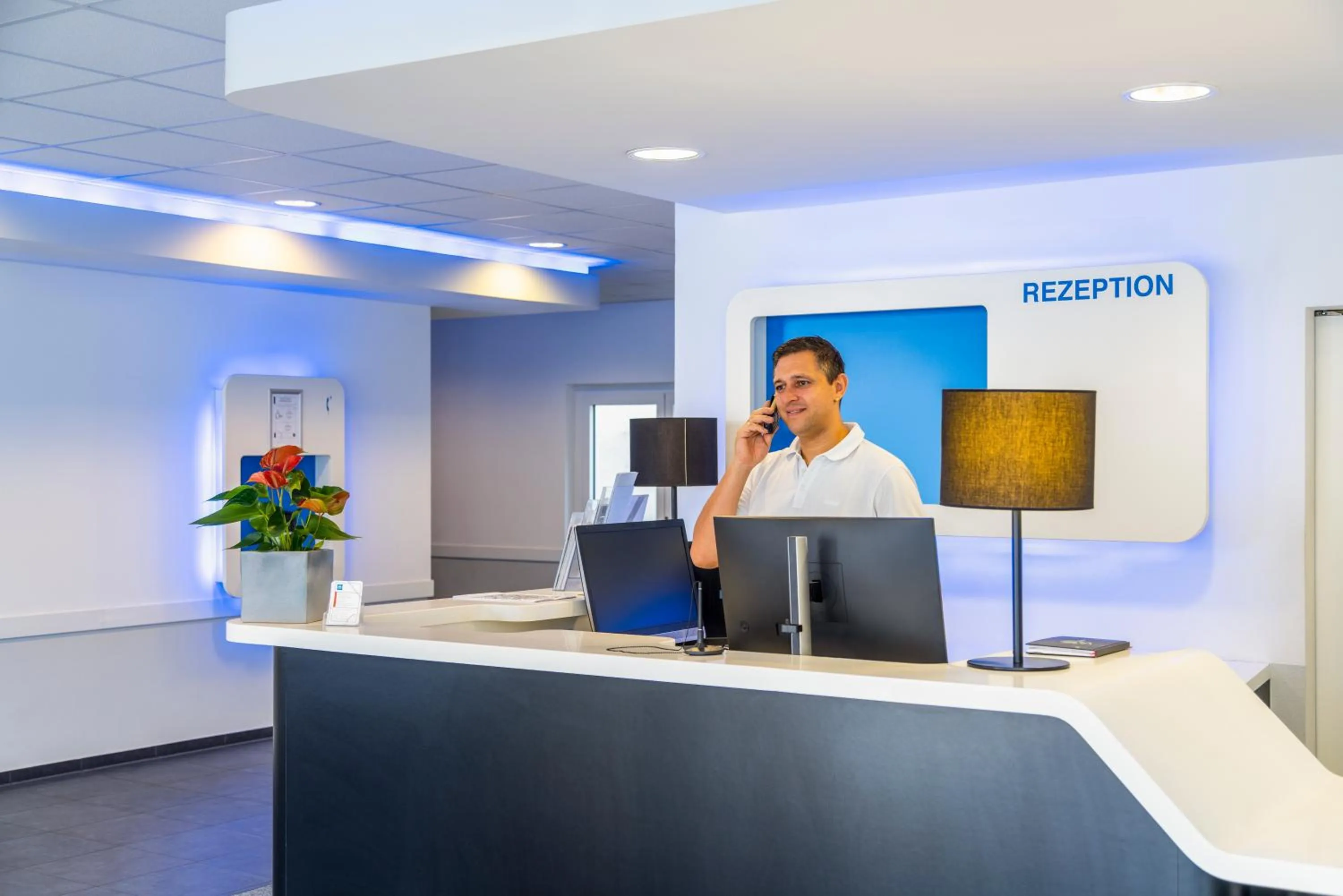 Lobby or reception in ibis budget Ulm City