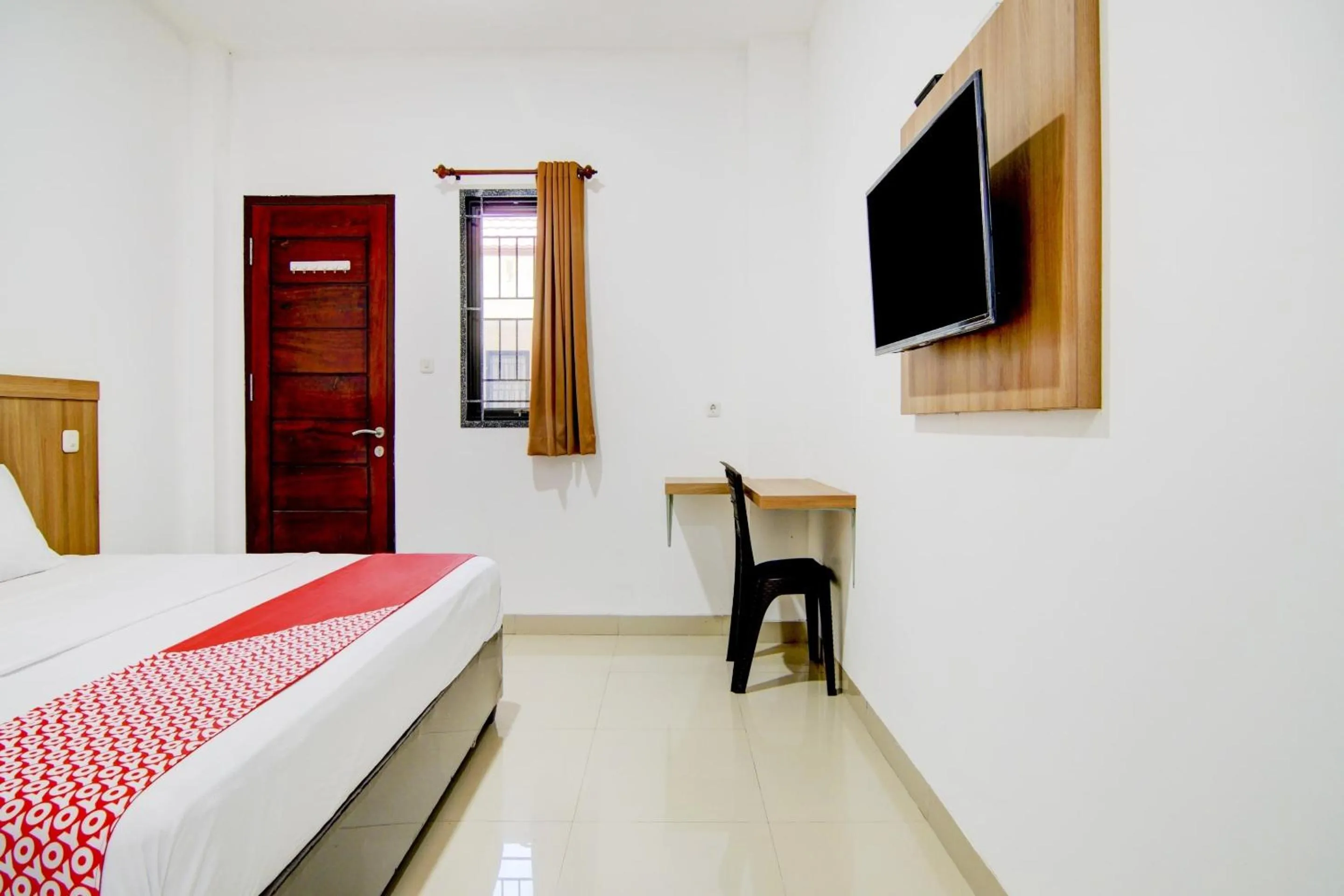 Bedroom in OYO 90233 The Shine Residence