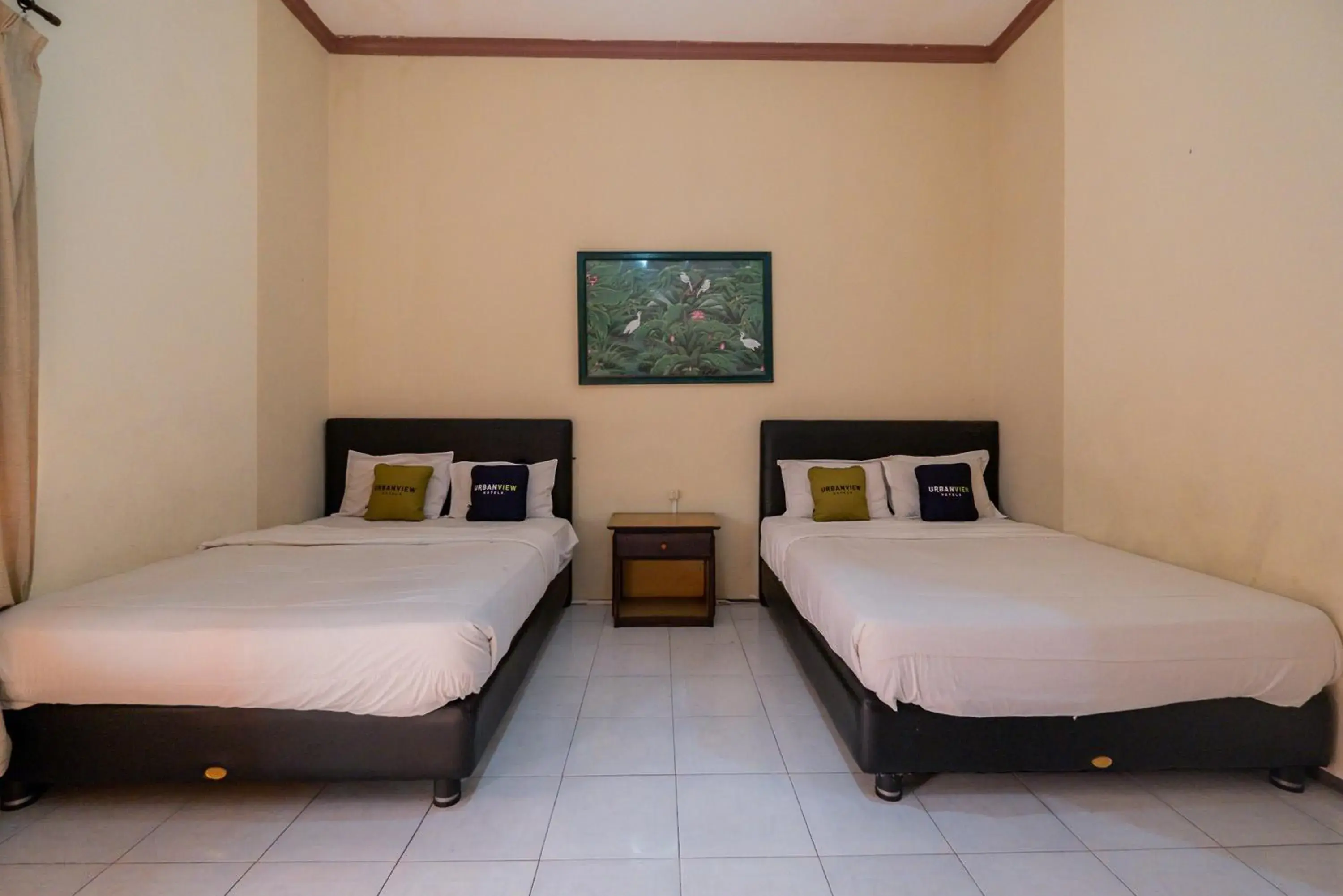 Bed in Urbanview Hotel Near Jatim Park 1 by RedDoorz Bed in Urbanview Hotel Near Jatim Park 1 by RedDoorz