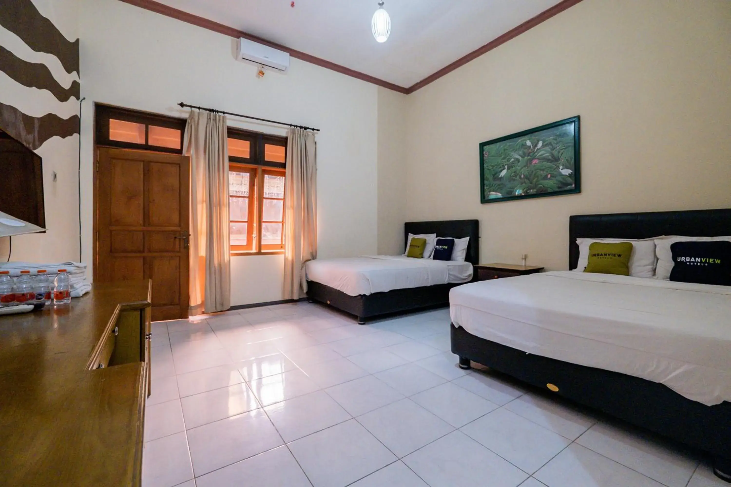 Bed in Urbanview Hotel Near Jatim Park 1 by RedDoorz Bed in Urbanview Hotel Near Jatim Park 1 by RedDoorz