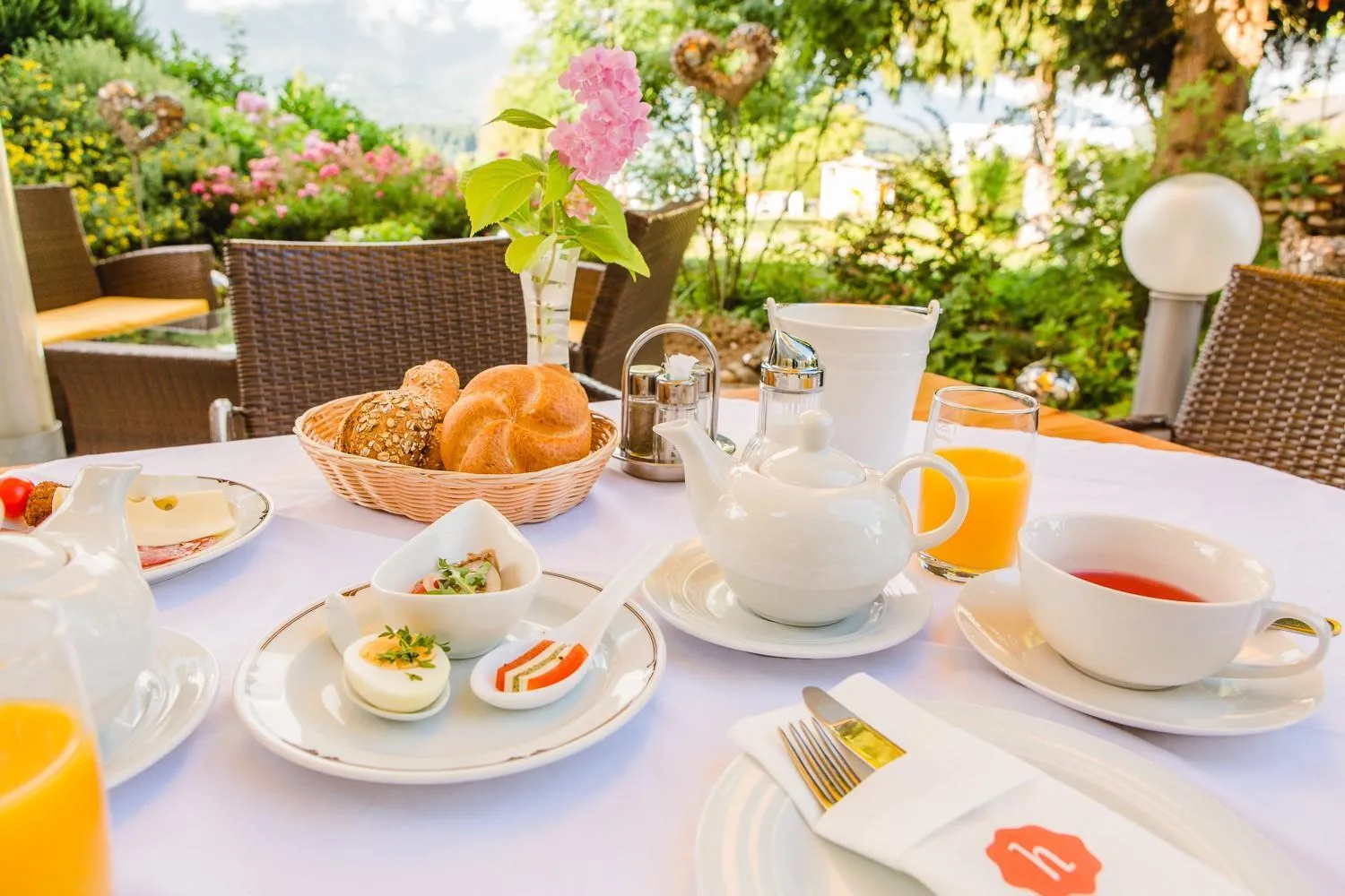 Garden view in Das Moser - Hotel Garni am See (Adults Only)