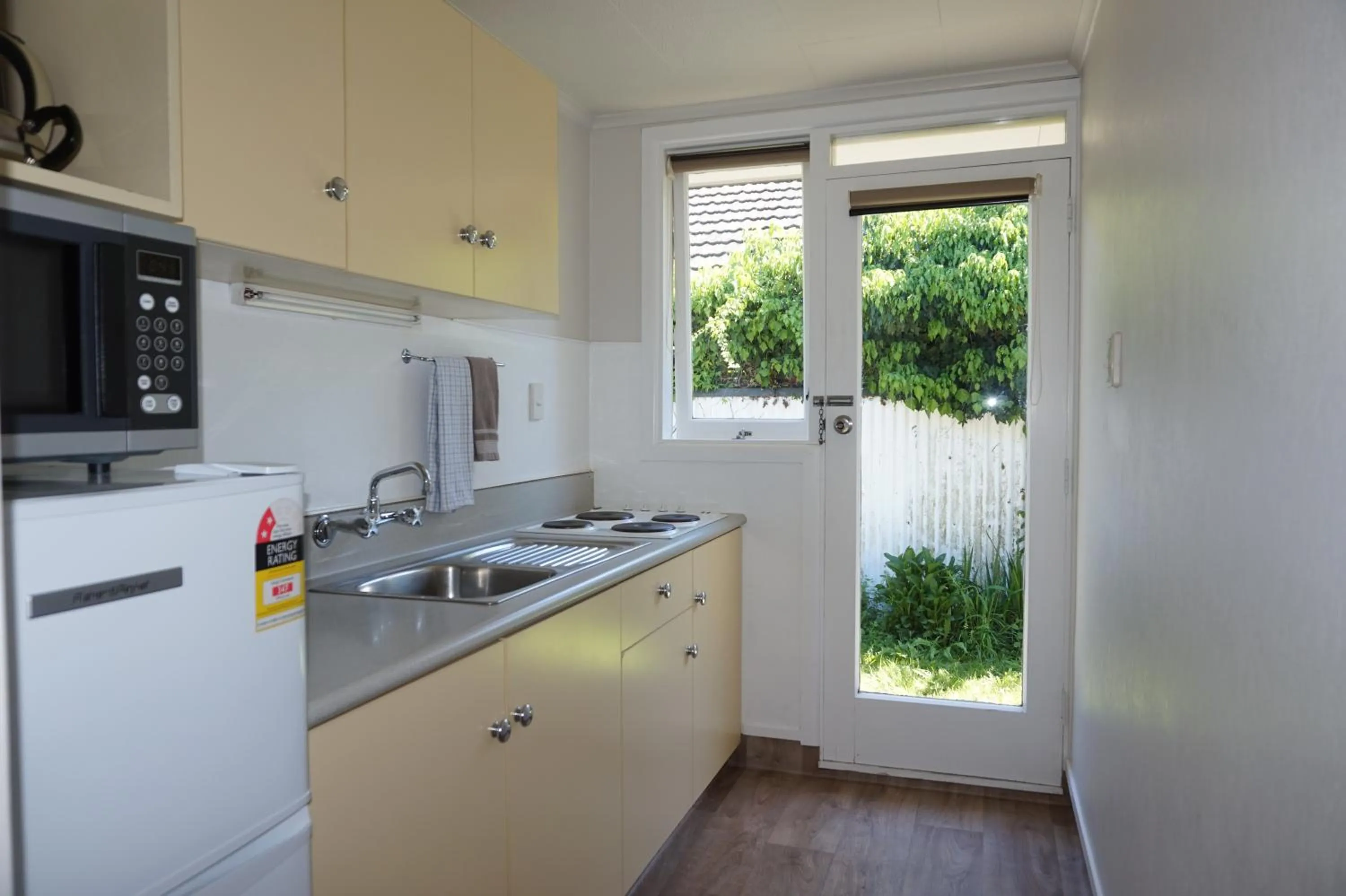Kitchen or kitchenette in Ashleigh Court Motel-Christchurch Hagley Park