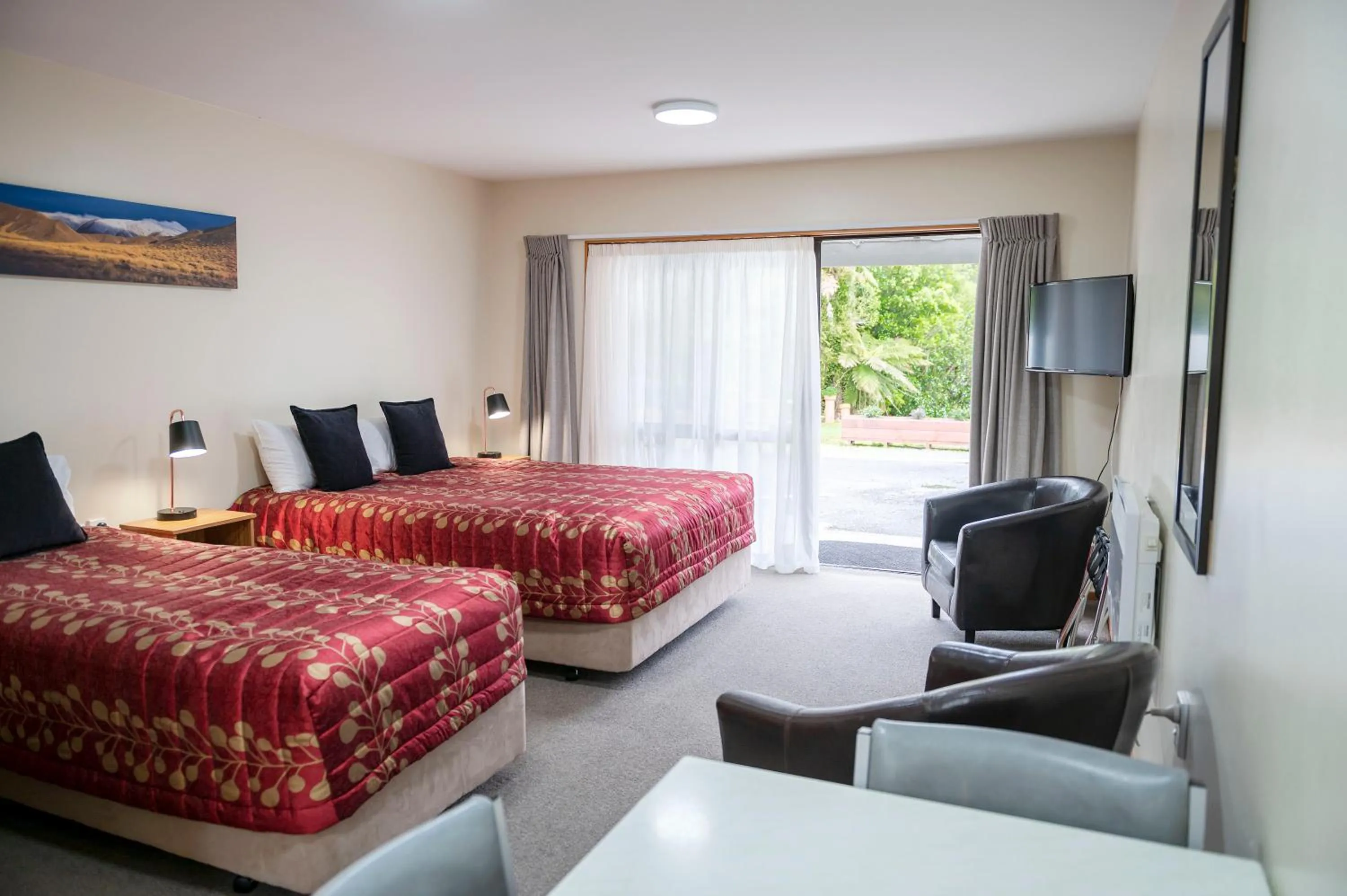 Bed in ASURE Aspiring Court Motel