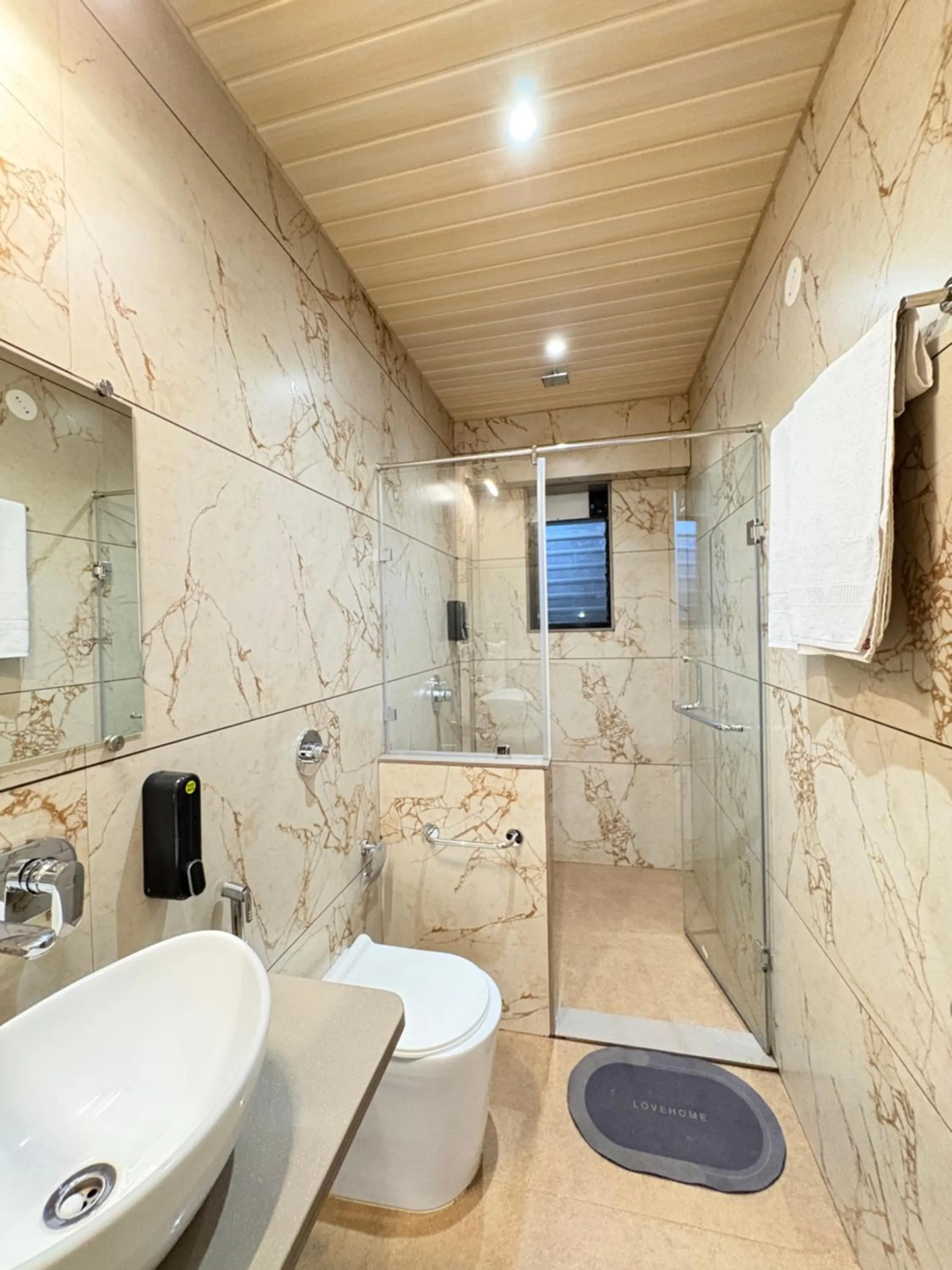 Shower in Girivihar Holiday Club - Pure Veg