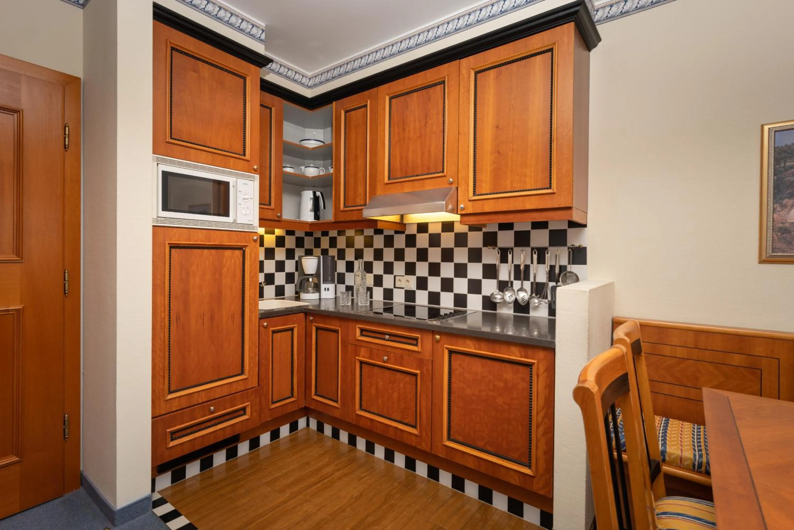 Kitchen or kitchenette in MONDI Hotel Bellevue Gastein