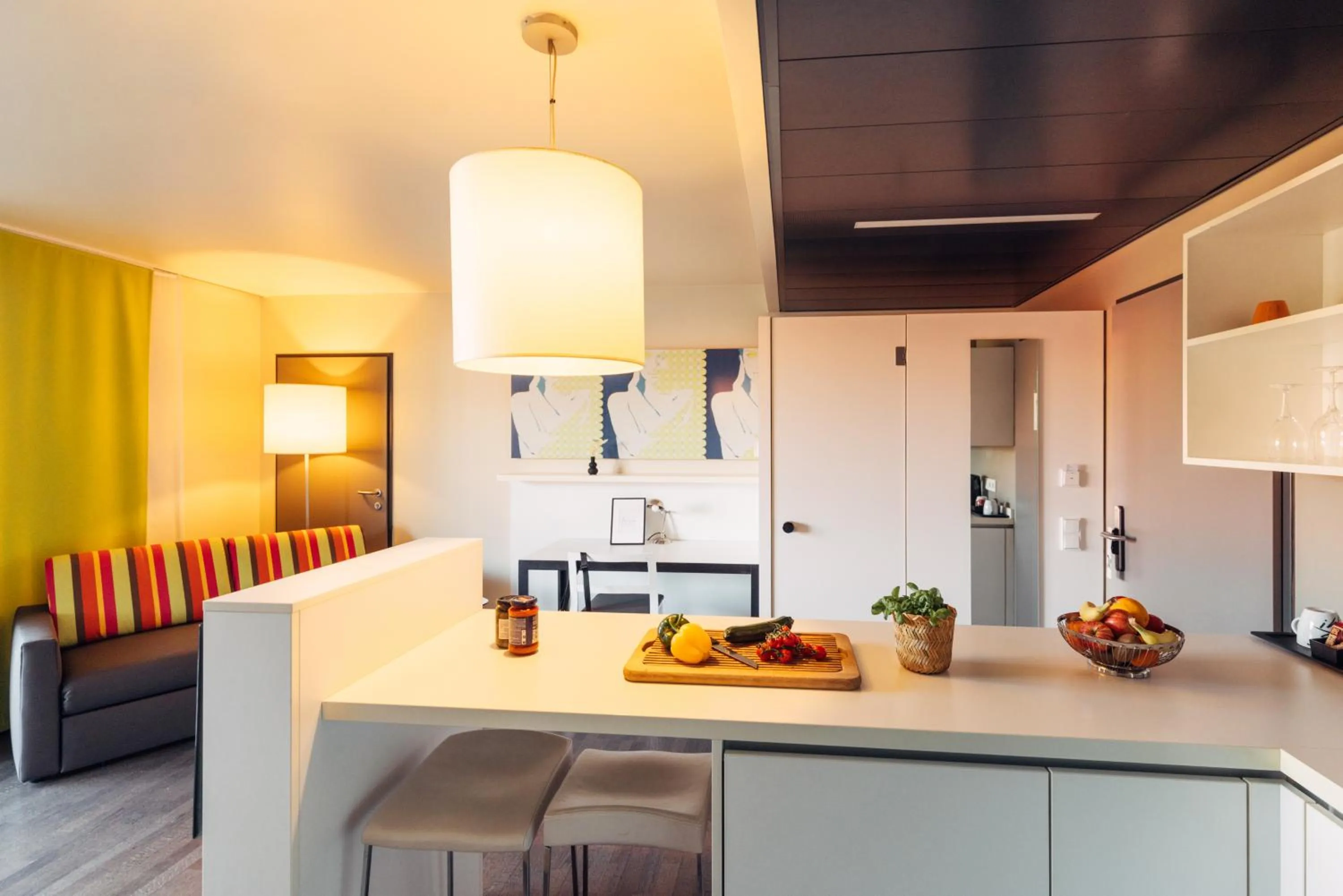 Kitchen or kitchenette in harry's home Hart bei Graz hotel & apartments