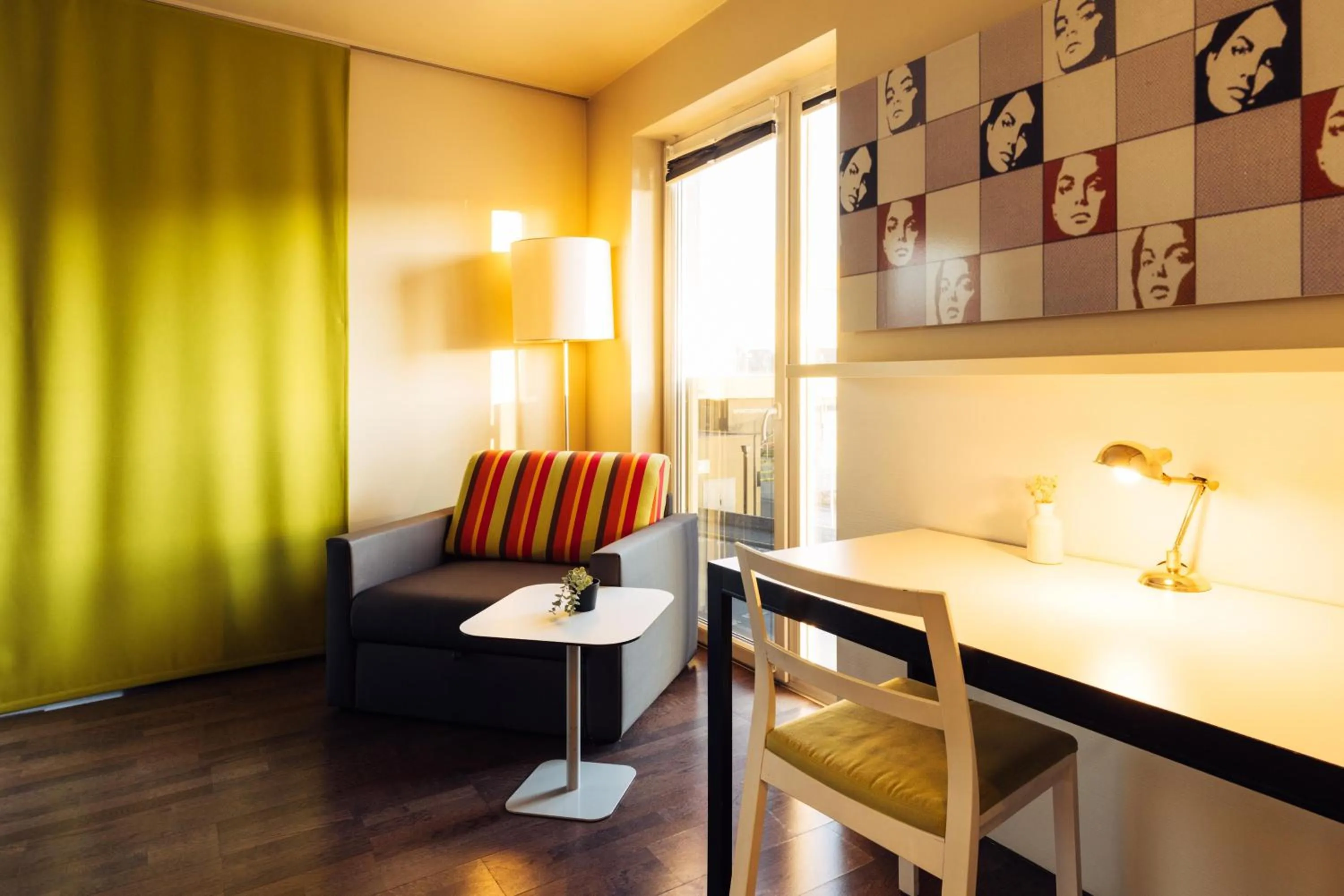 Photo of the whole room in harry's home Hart bei Graz hotel & apartments