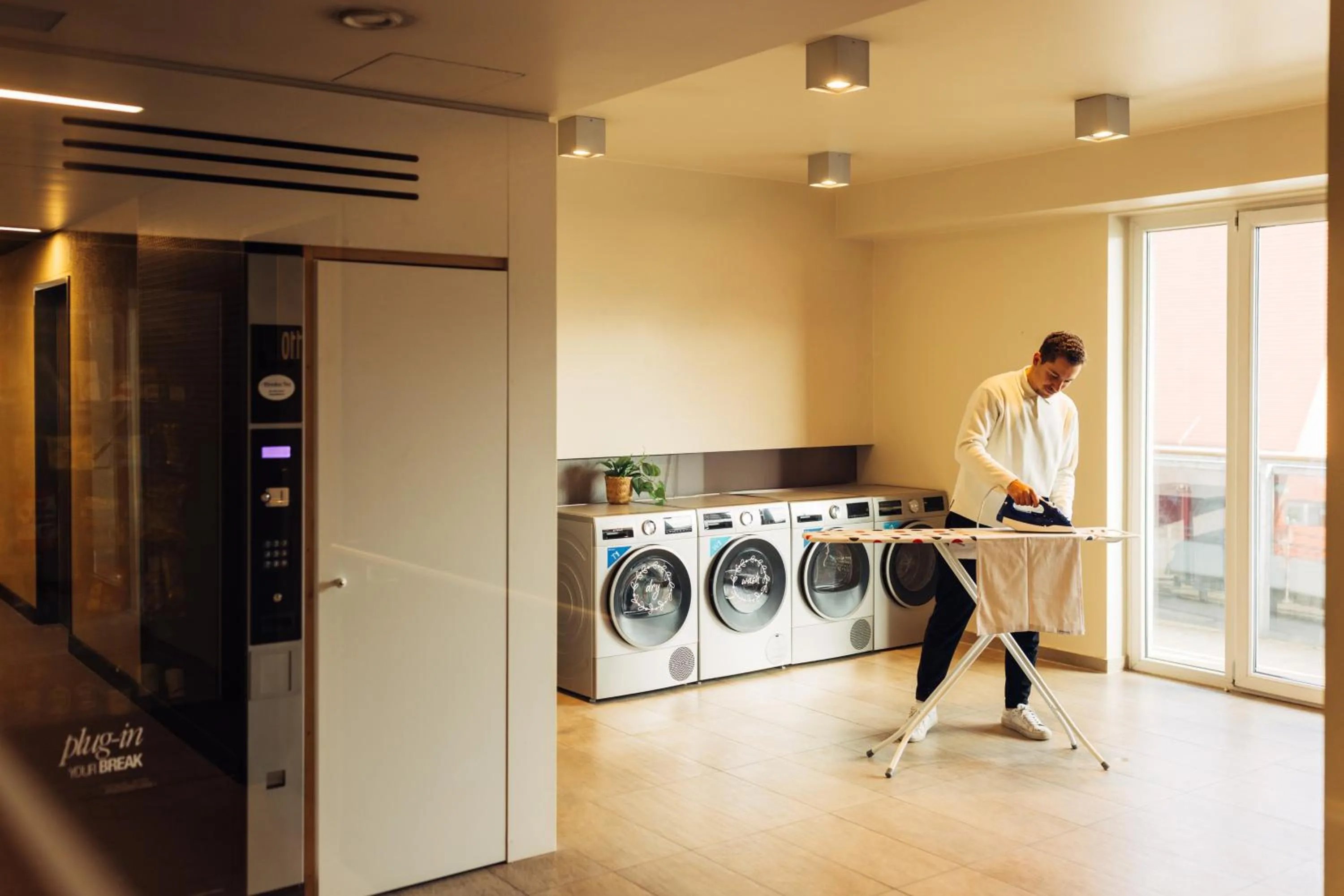 washing machine in harry's home Hart bei Graz hotel & apartments