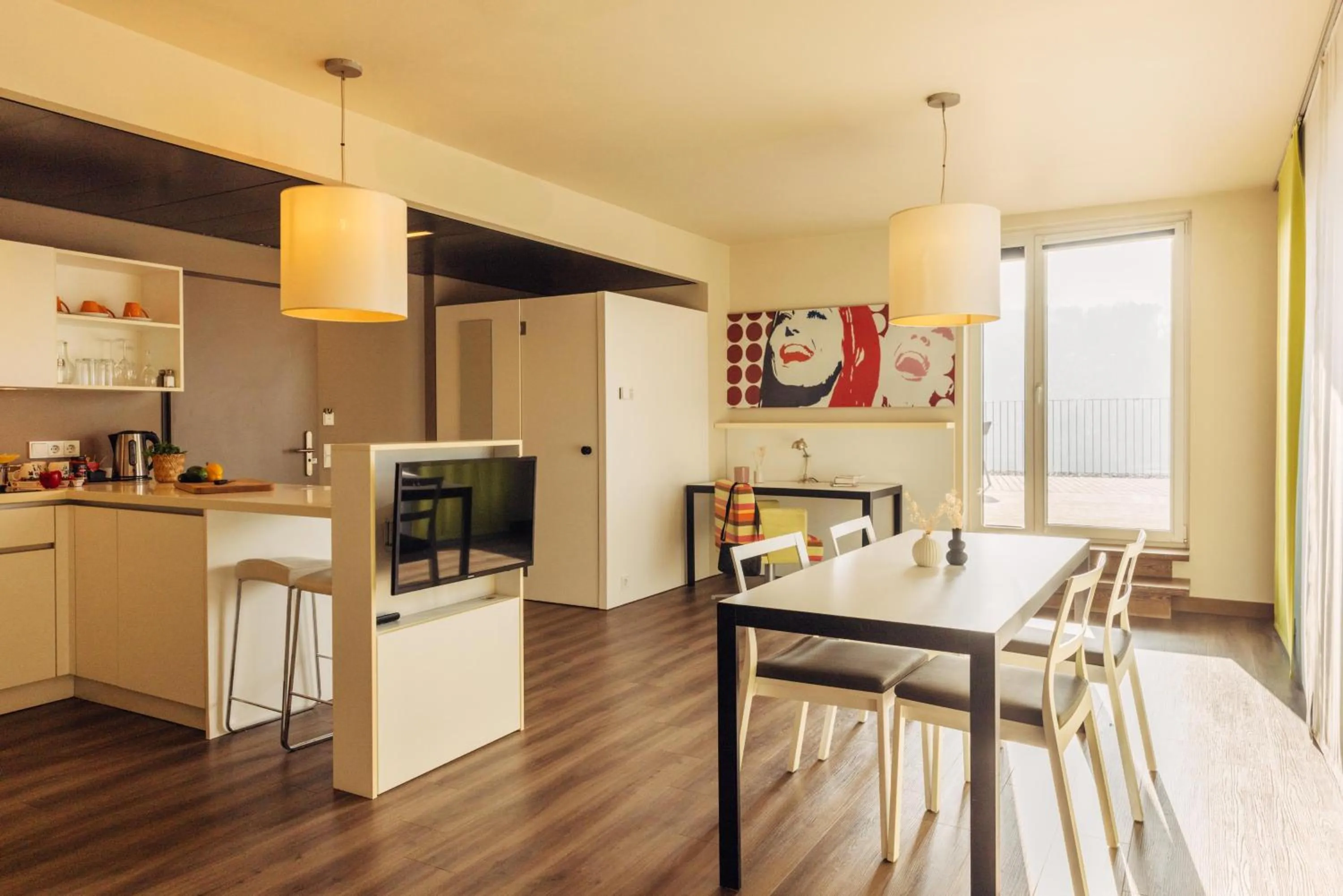 Photo of the whole room in harry's home Hart bei Graz hotel & apartments