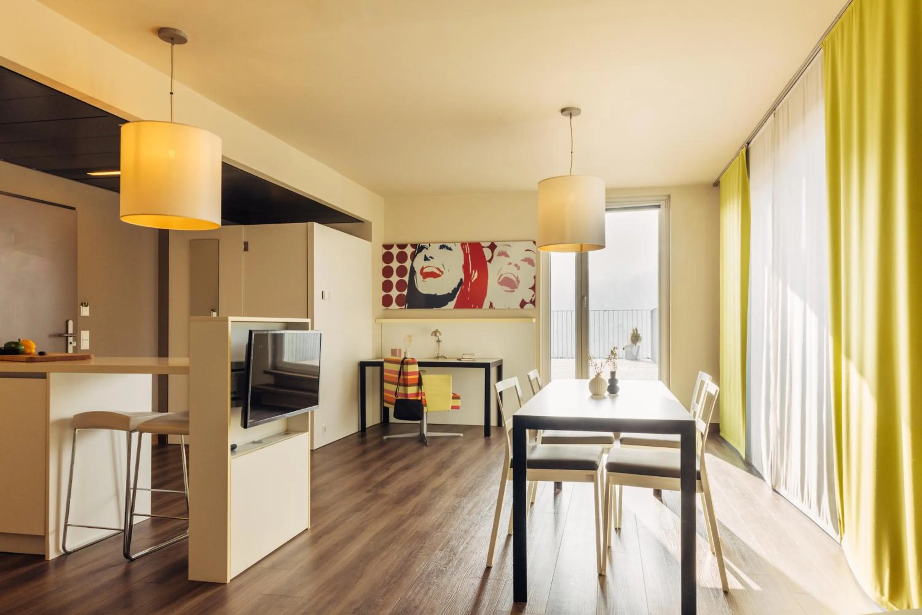 Kitchen or kitchenette in harry's home Hart bei Graz hotel & apartments