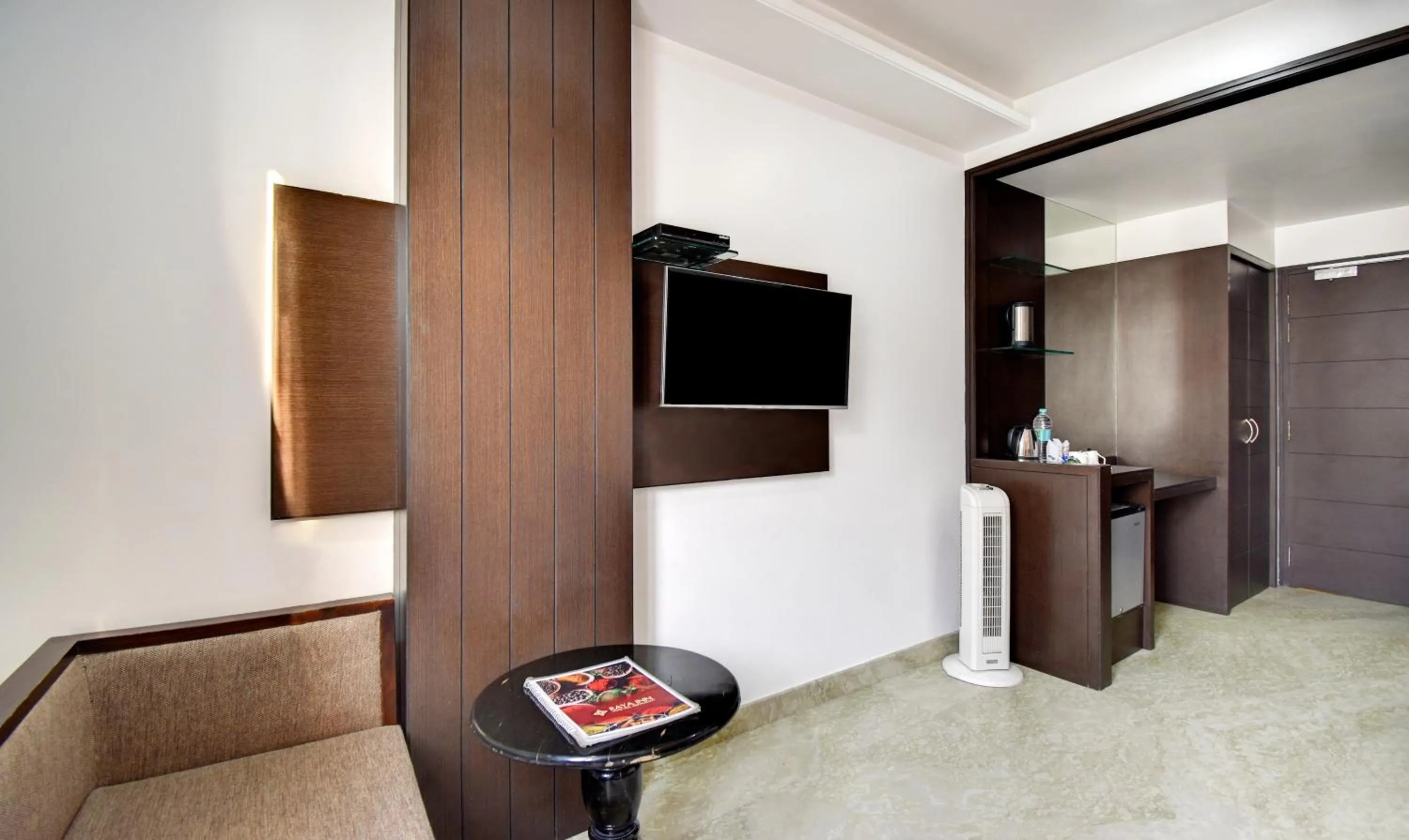 Seating area in Hotel Raya Inn