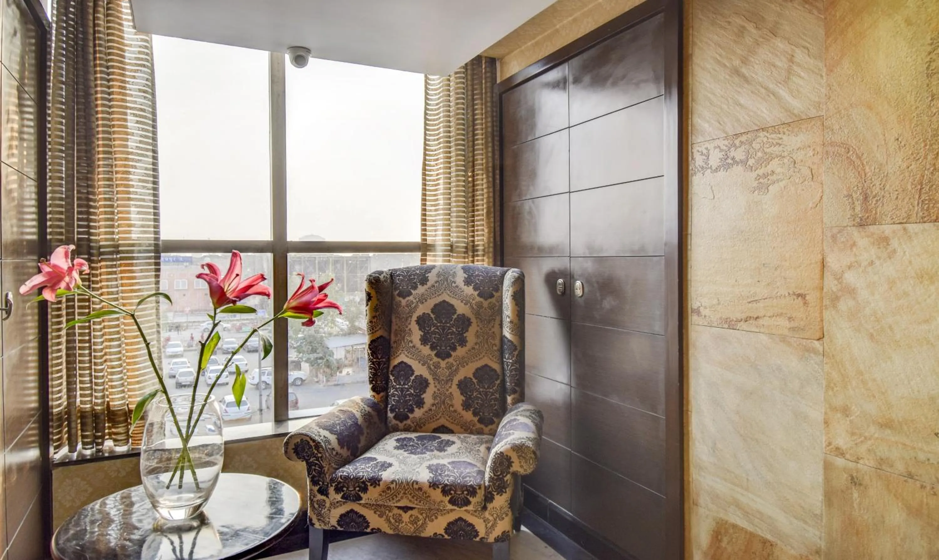 Seating area in Hotel Raya Inn