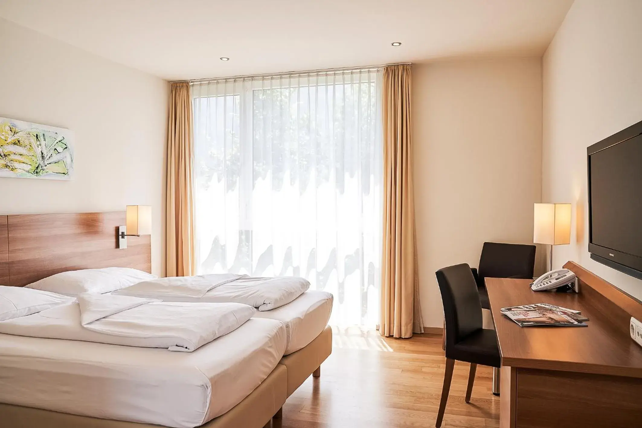 Photo of the whole room, Bed in Fairmotel Dornbirn Photo of the whole room, Bed in Fairmotel Dornbirn