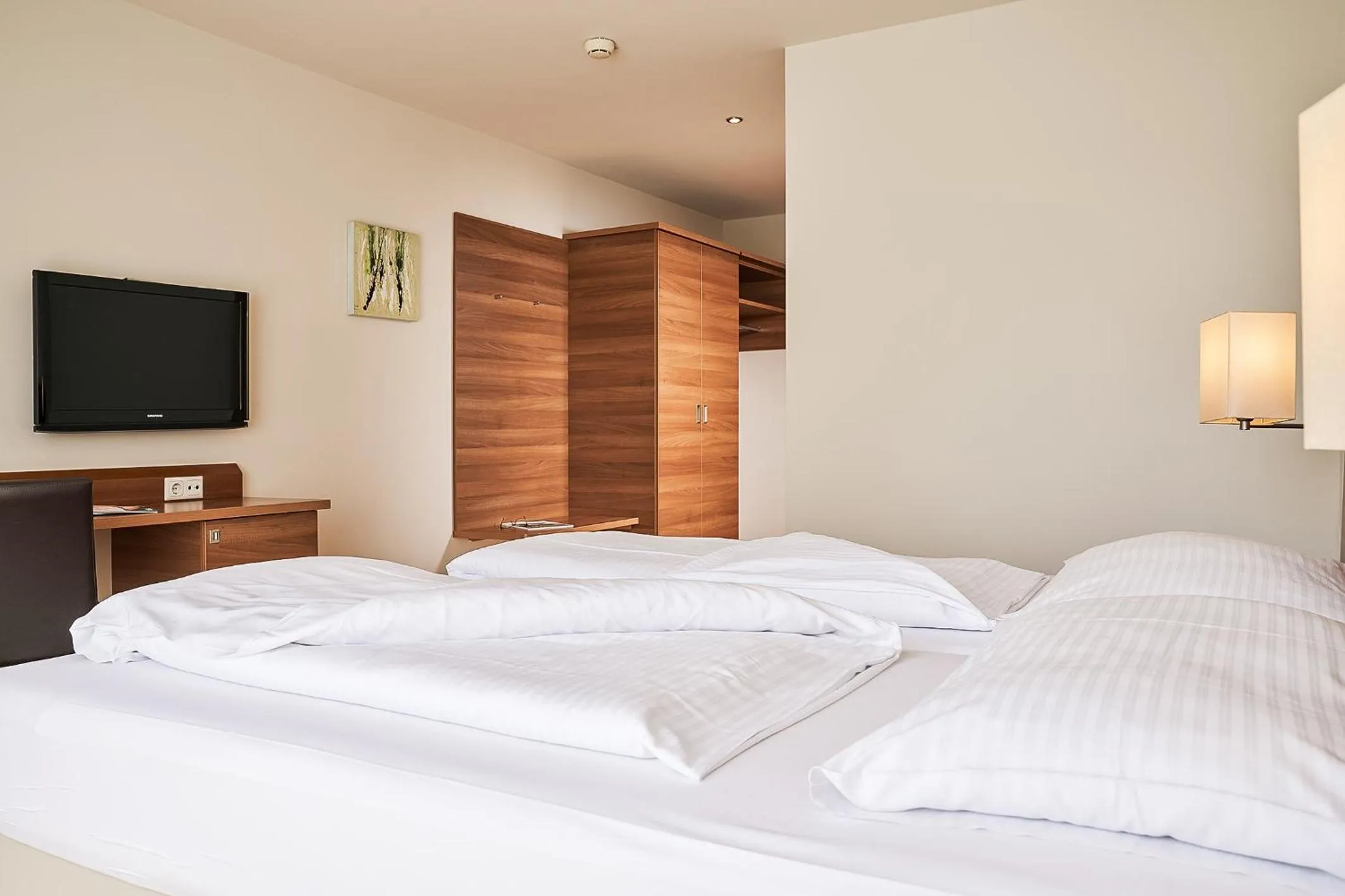 Photo of the whole room, Bed in Fairmotel Dornbirn