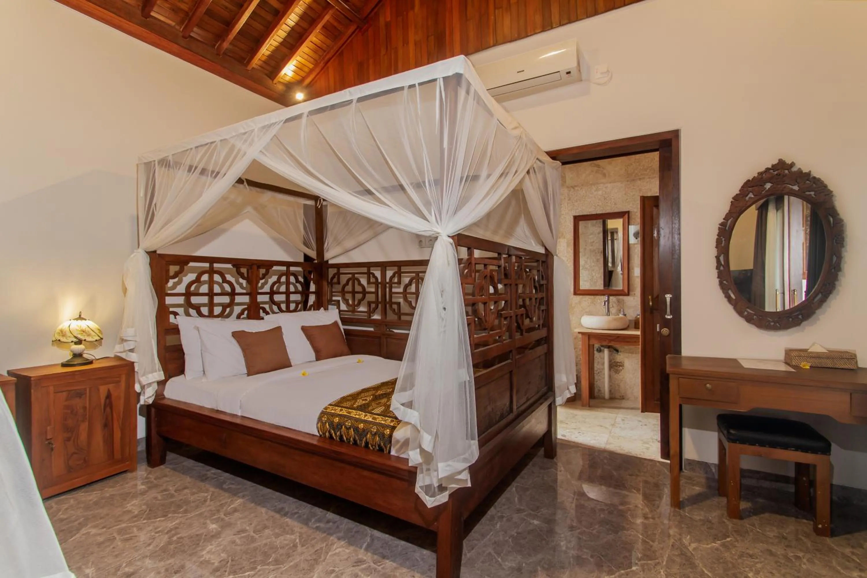 Bed in Graha Petulu Ubud by GenuineHost