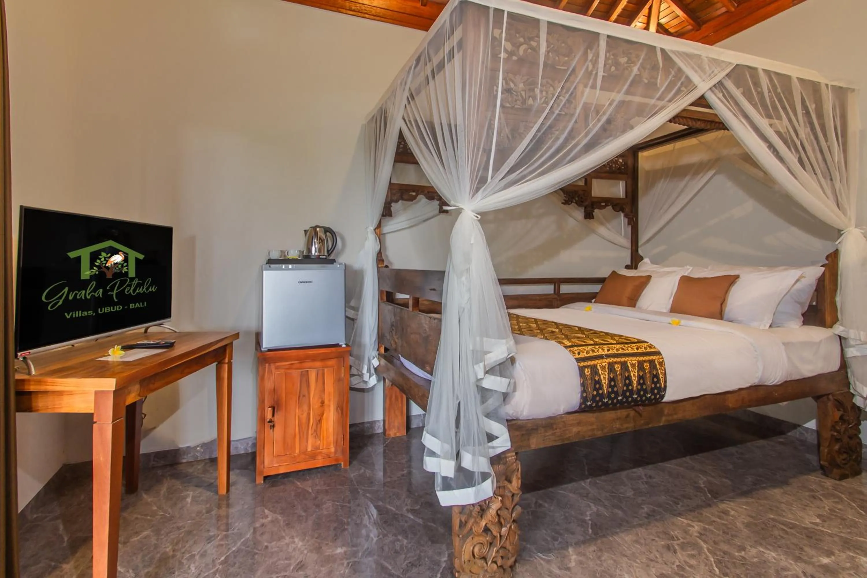 Bed in Graha Petulu Ubud by GenuineHost