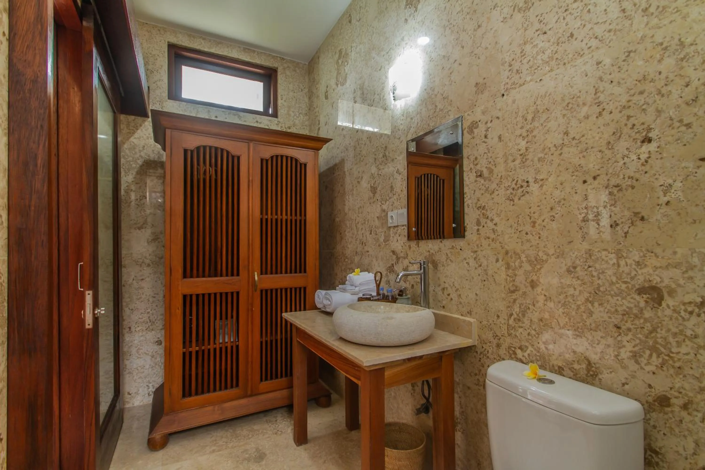 Bathroom in Graha Petulu Ubud by GenuineHost