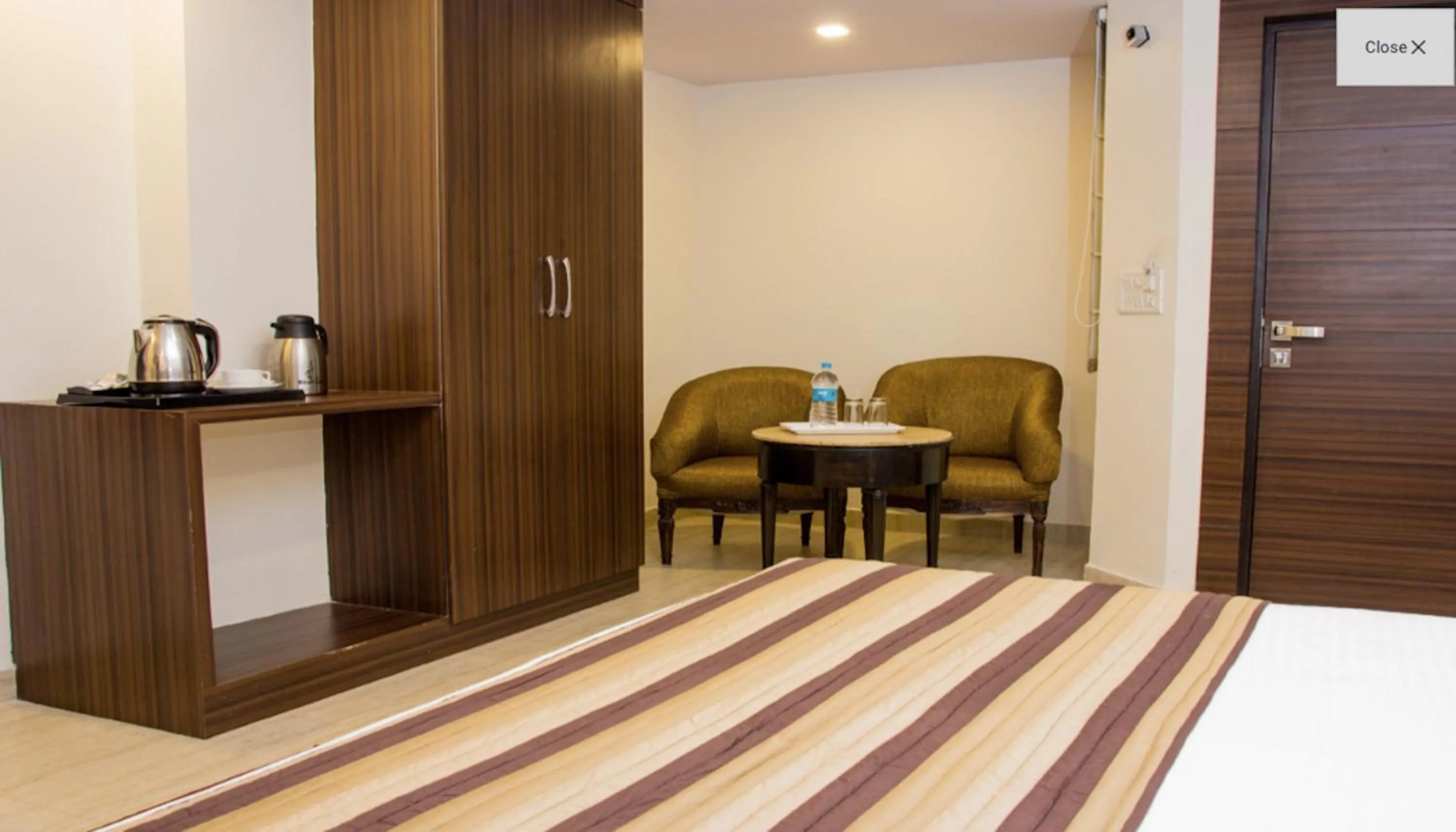 Bedroom in Hotel Pawan Plaza - Near BLK and Ganga Ram Hospital - Karol Bagh