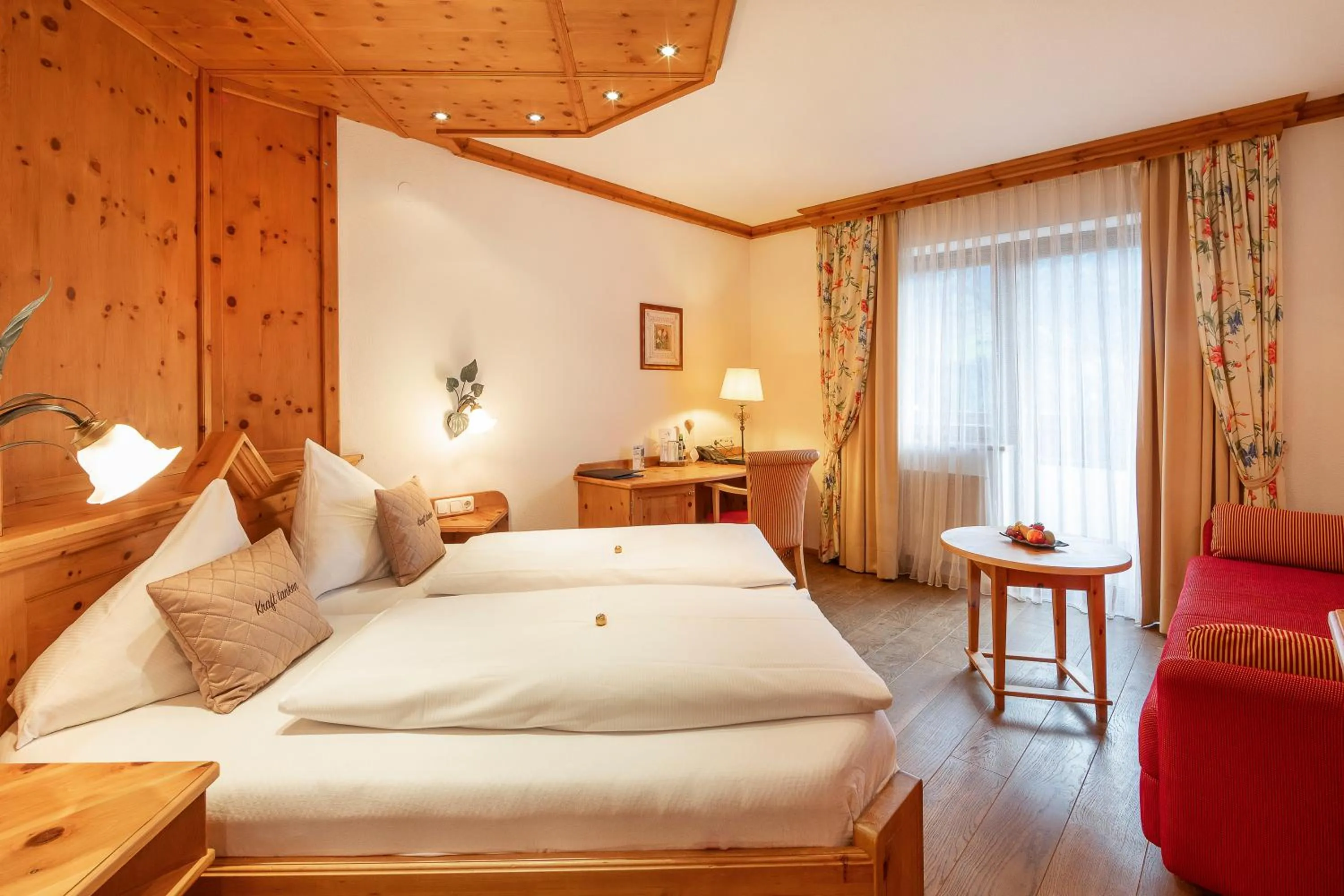 Photo of the whole room, Bed in Aktivhotel Alpendorf