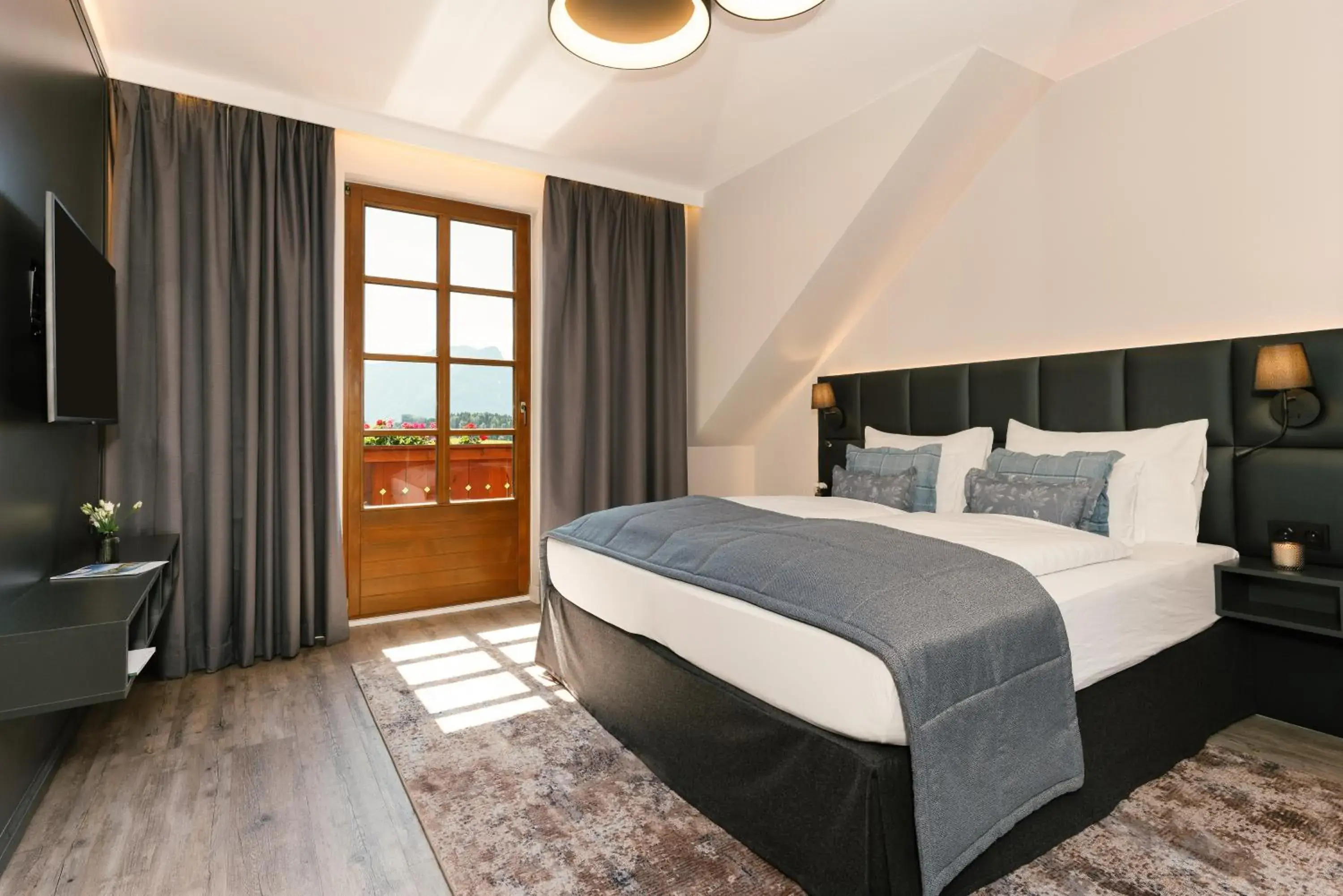 Photo of the whole room, Bed in MONDI Hotel am Grundlsee Photo of the whole room, Bed in MONDI Hotel am Grundlsee