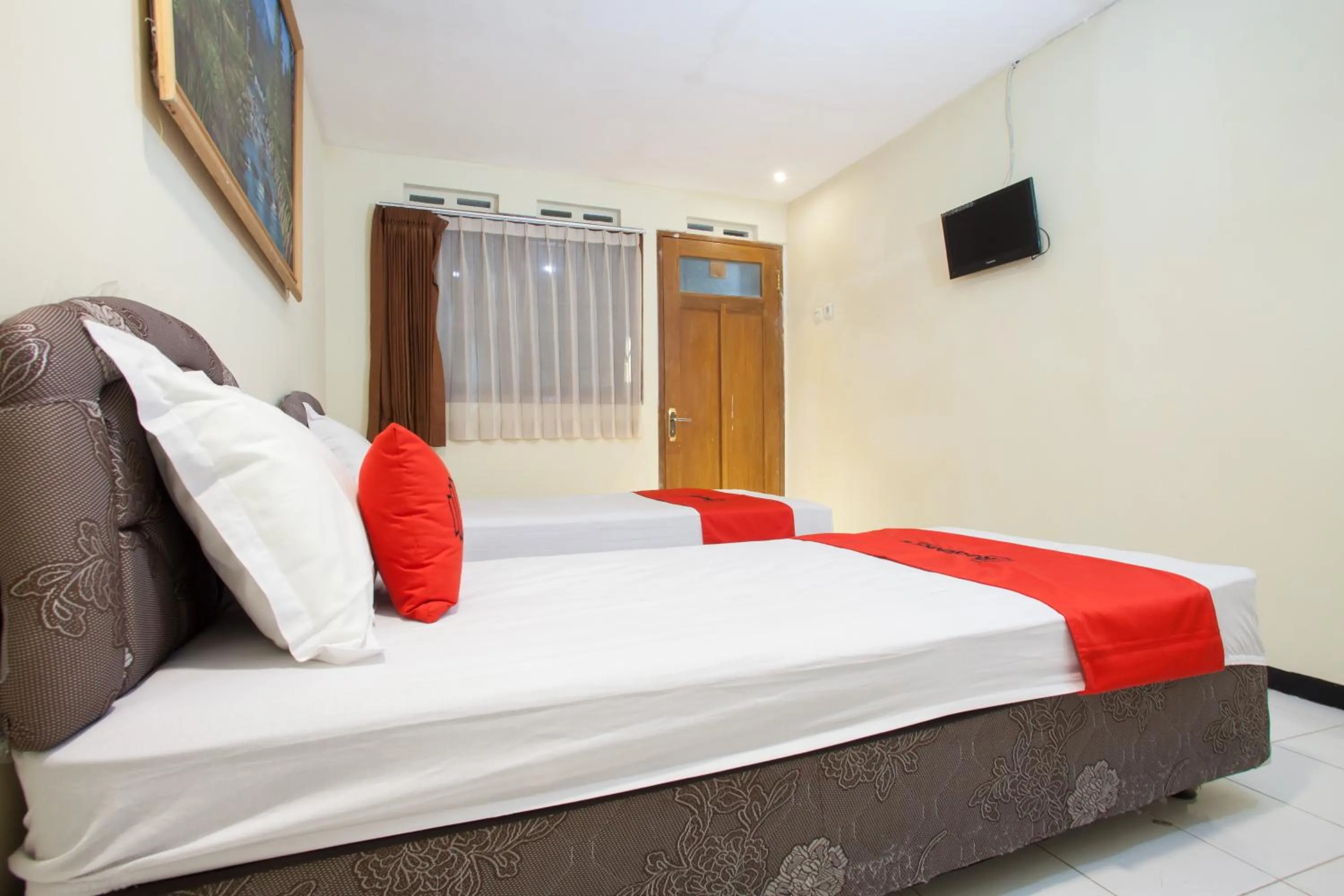 Bed in RedDoorz At Pandan Inn Batu
